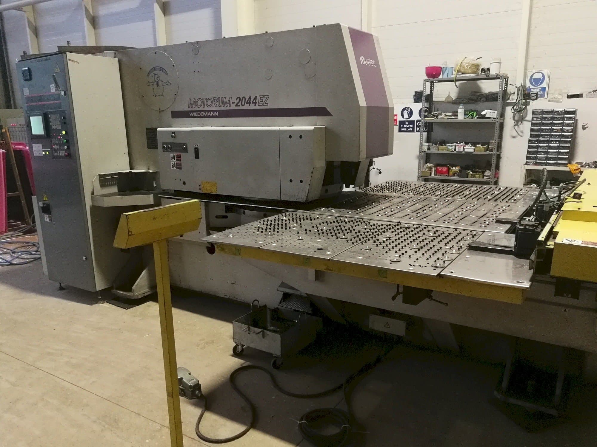 Left side view of Muratec Motorum 2044 EZ machine