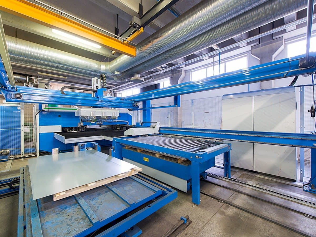 Left side view of Finn-Power E 5 Lui machine