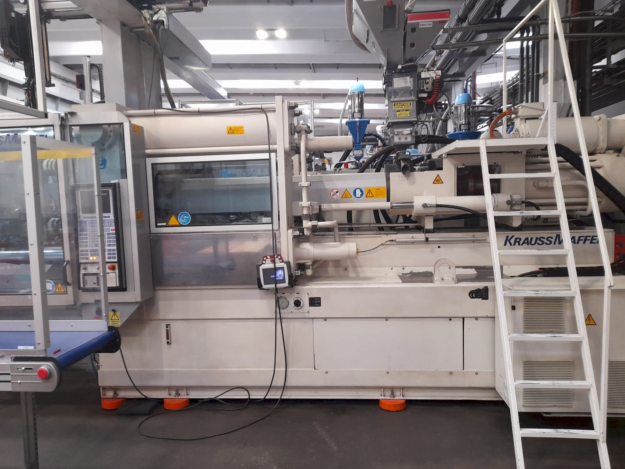Front view of Krauss Maffei KM 450-3500 C3  machine