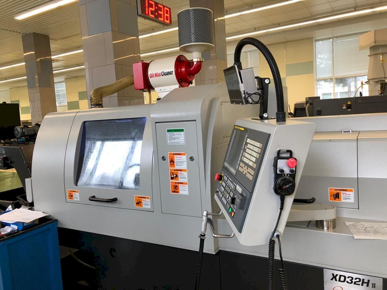 Front view of Hanwha XD32H II machine