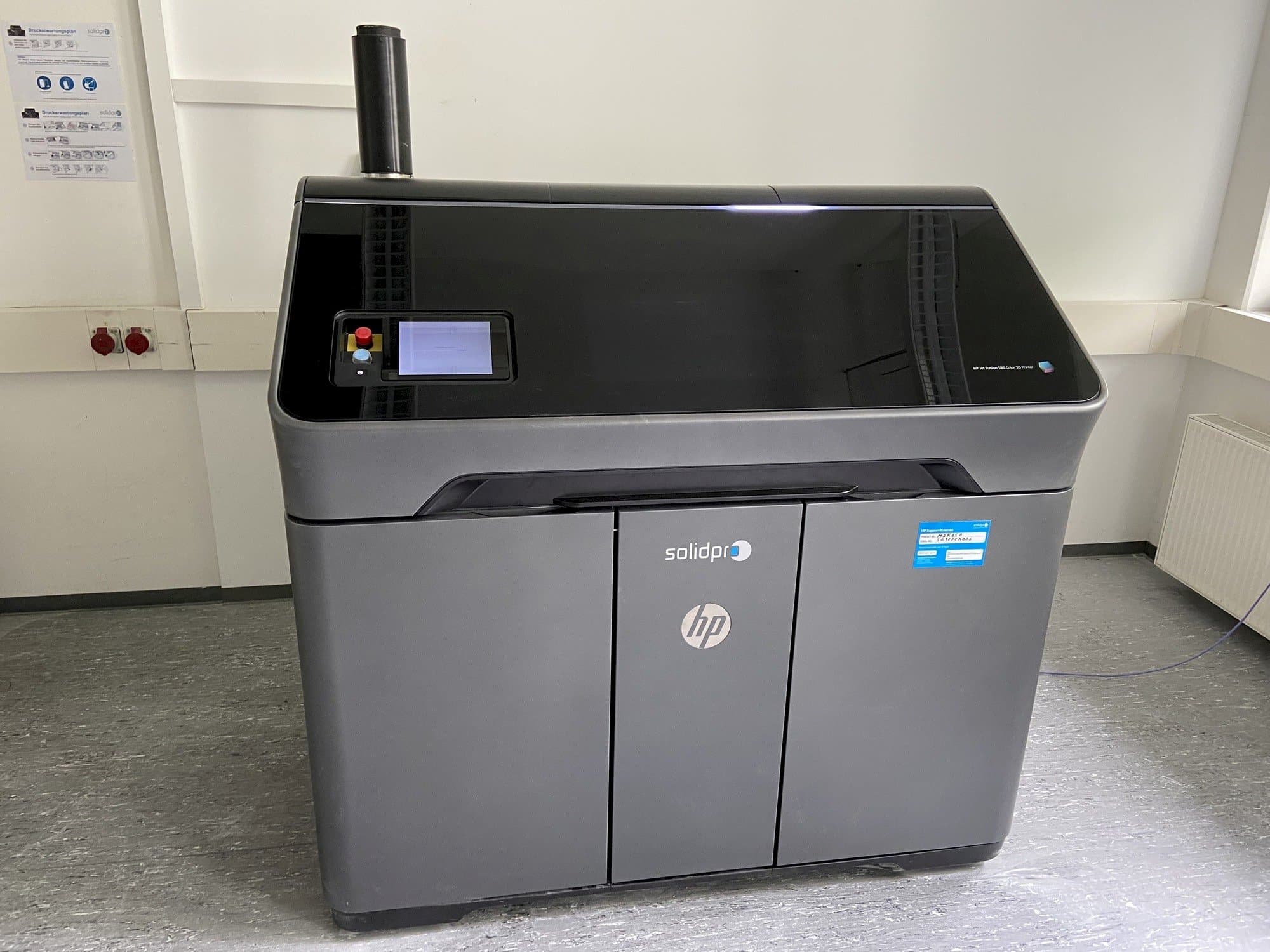 Front view of HP Jet Fusion 580 Color 3D printer machine