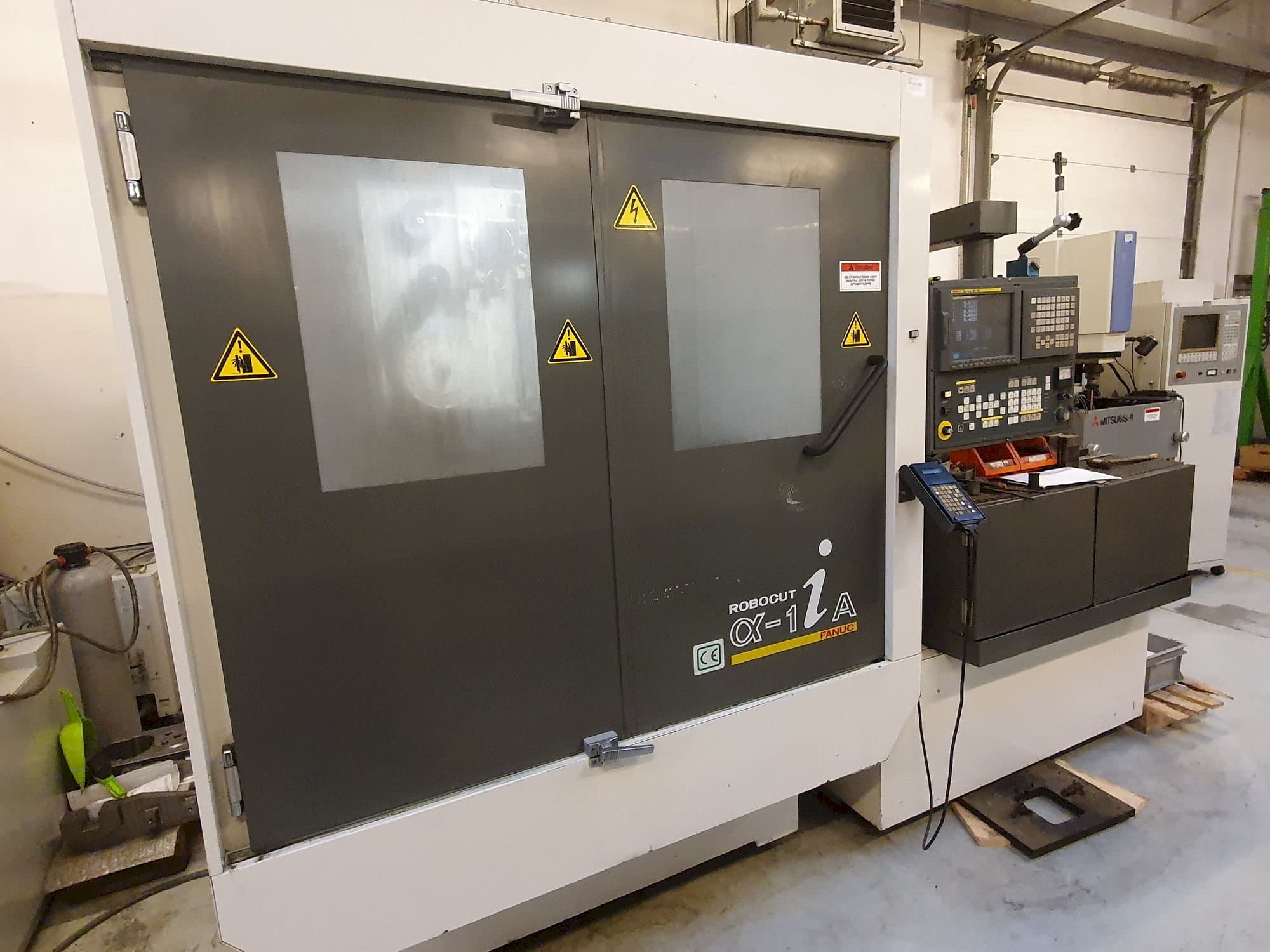 Front view of FANUC Robocut Alpha-1iA machine