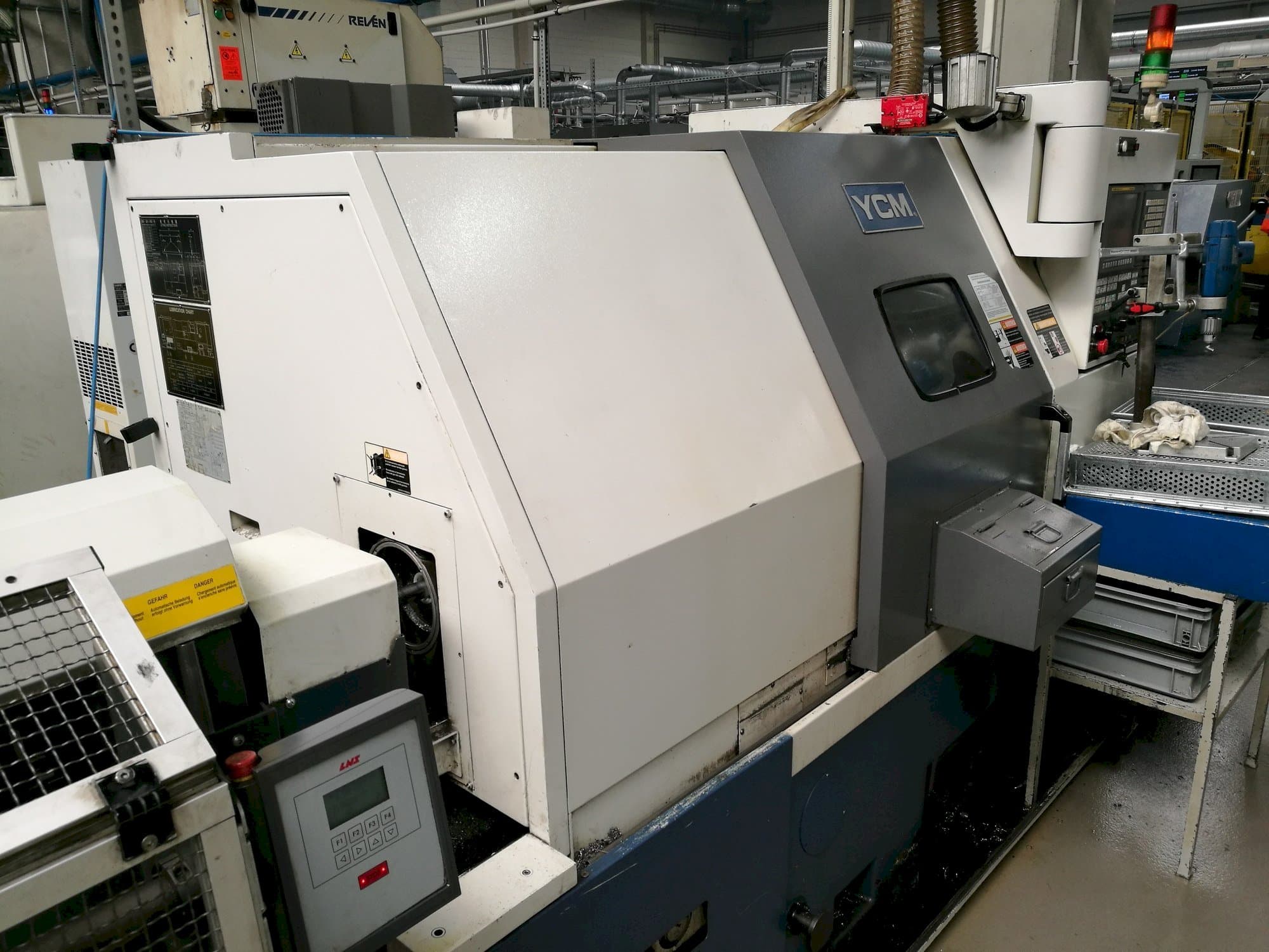 Front view of YCM GT-250A machine