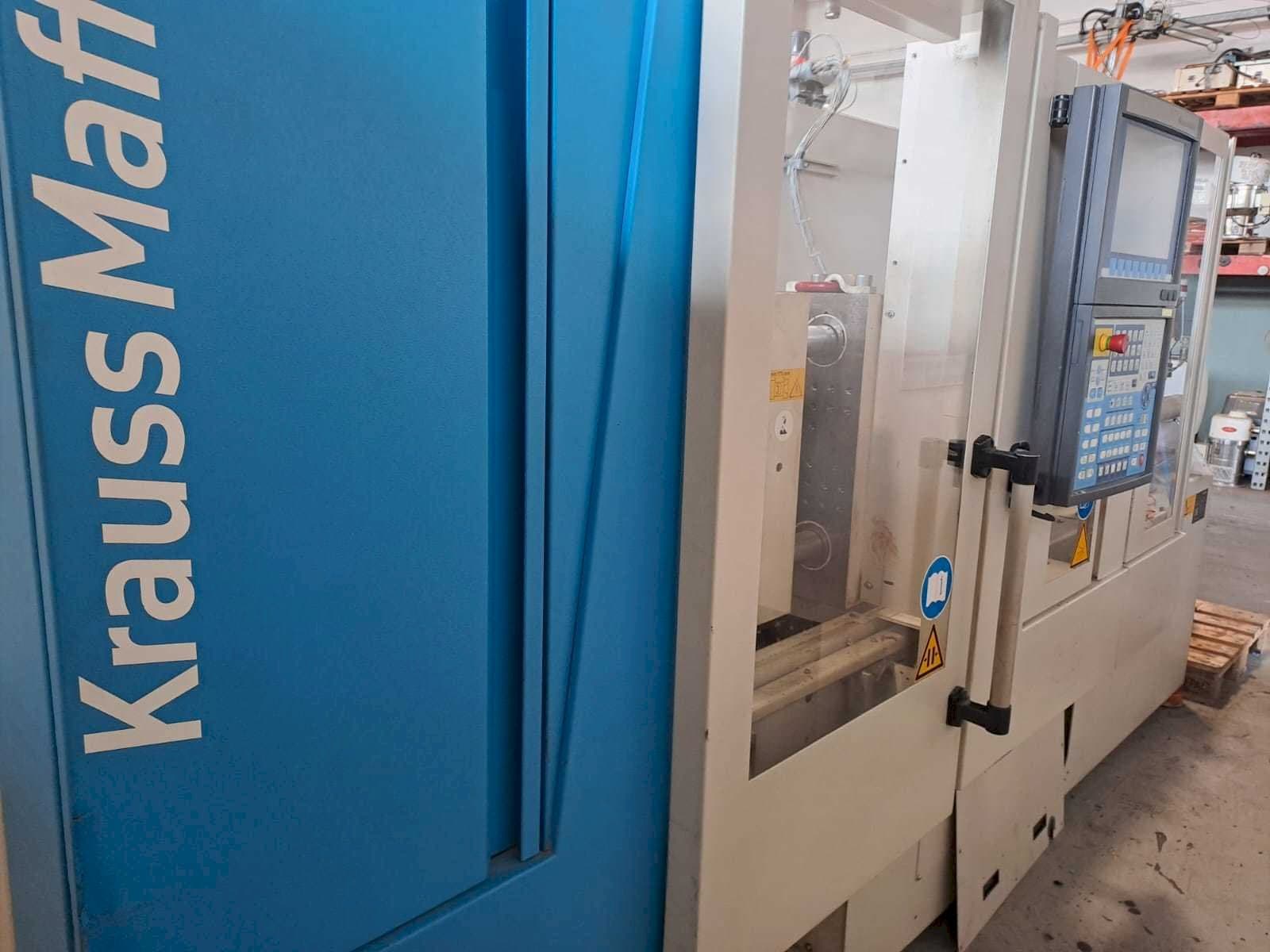 Front view of Krauss Maffei 35-180CX machine