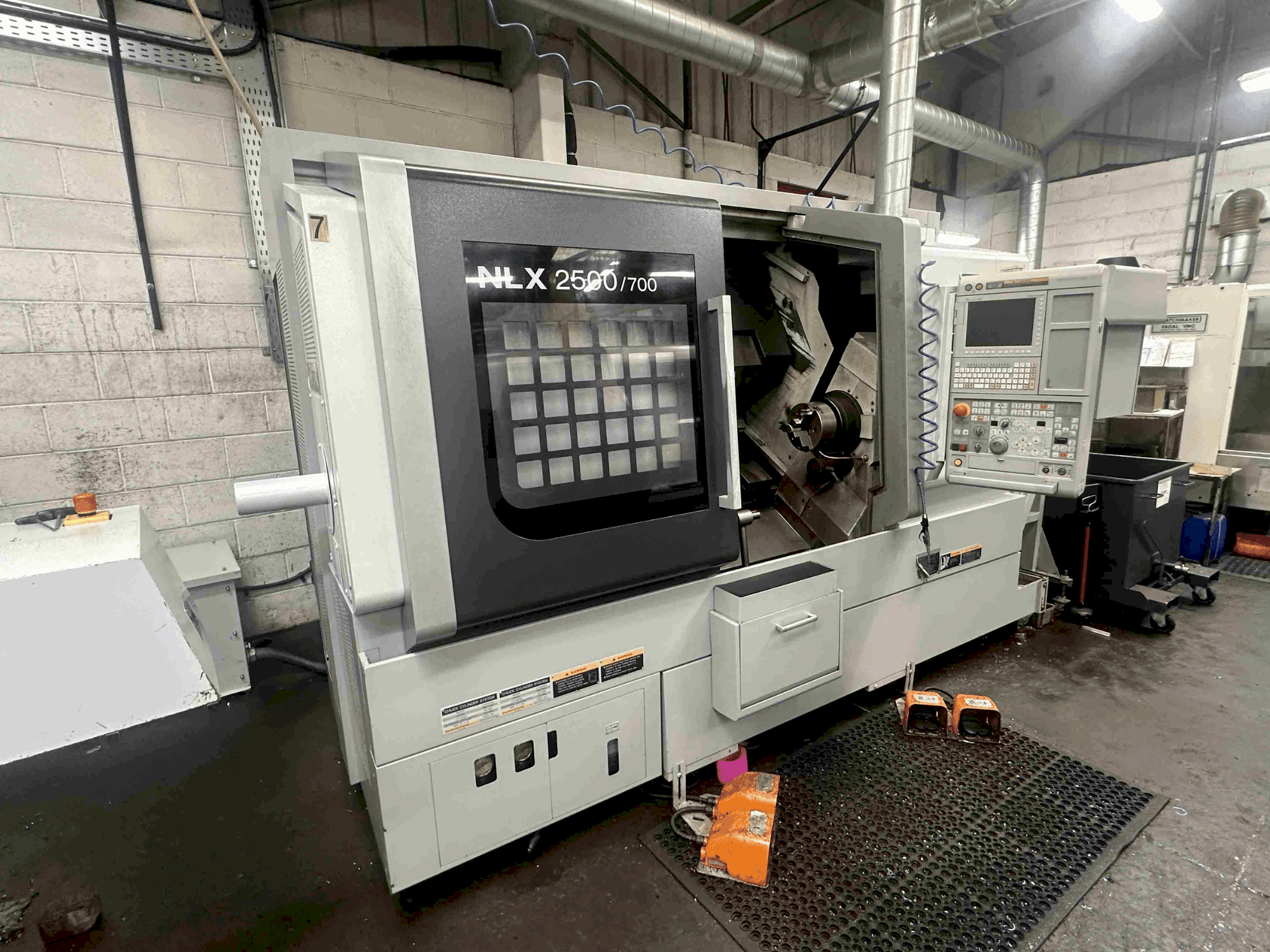 Left side view of DMG MORI NLX2500SY/700 machine