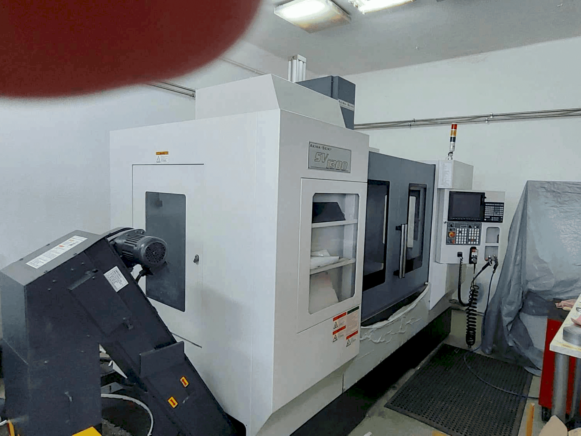 Front view of Akira Seiki SVI300 machine