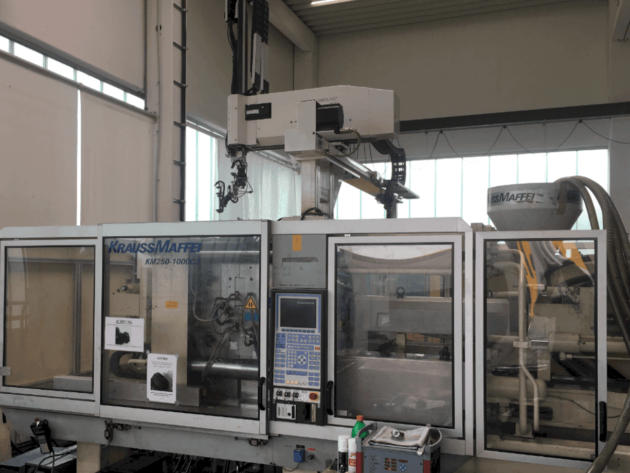 Front view of Krauss Maffei 250-1000 C2 machine