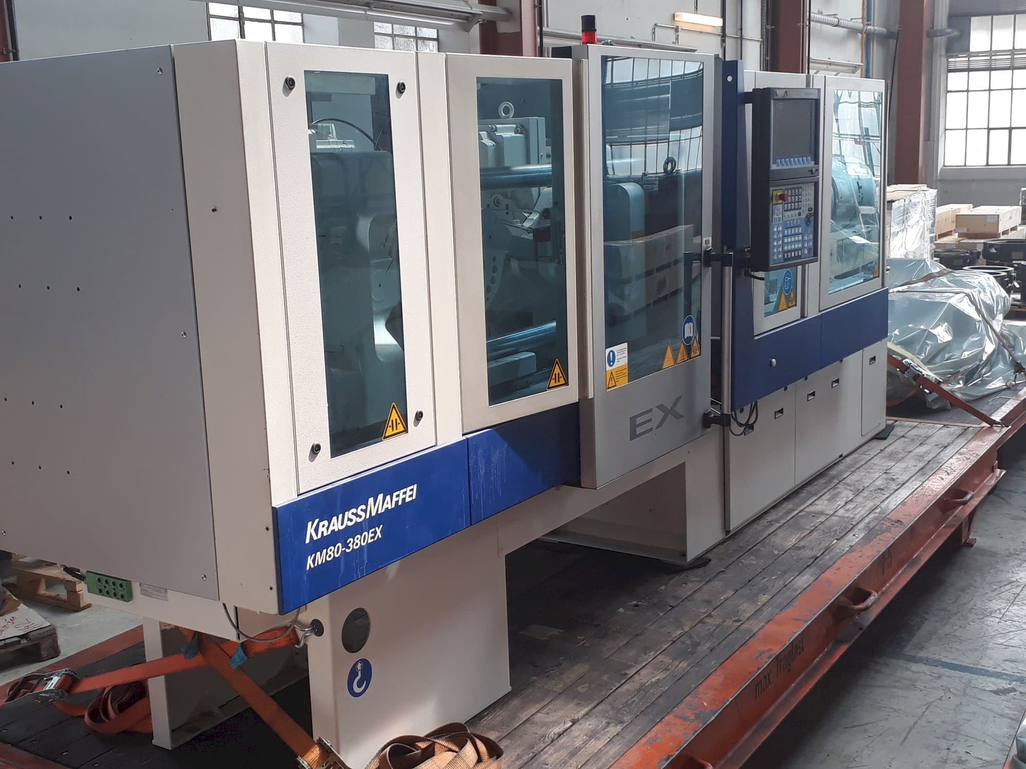 Front view of Krauss Maffei 80-380 EX machine