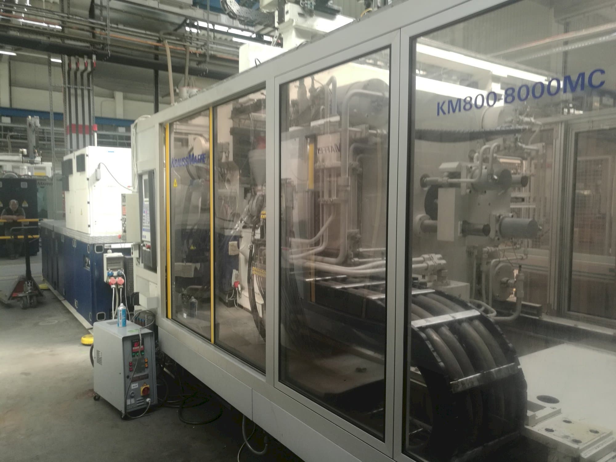 Front view of Krauss Maffei 800-8000 MC machine