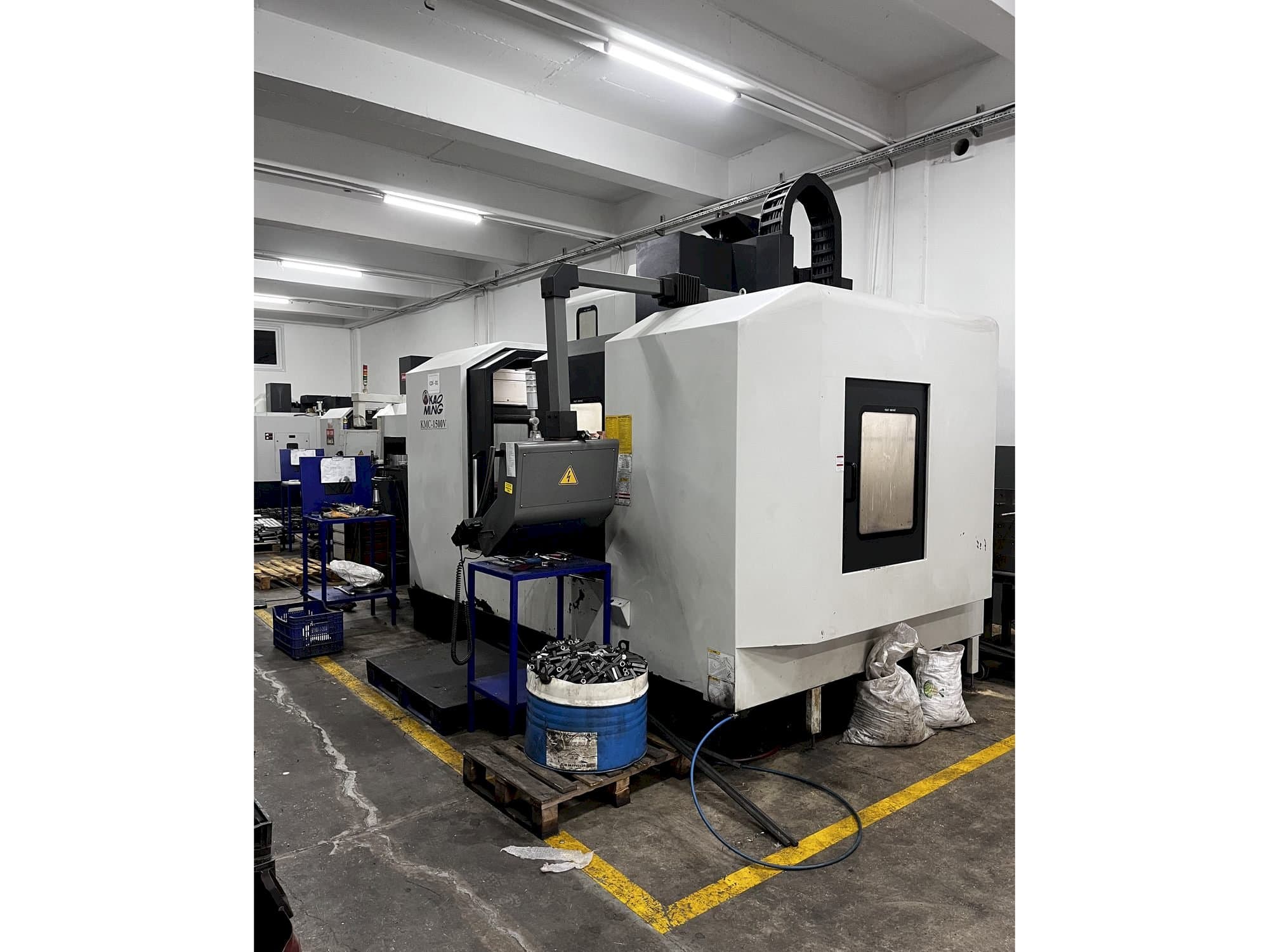 Front view of KAOMING KMC 1500V machine