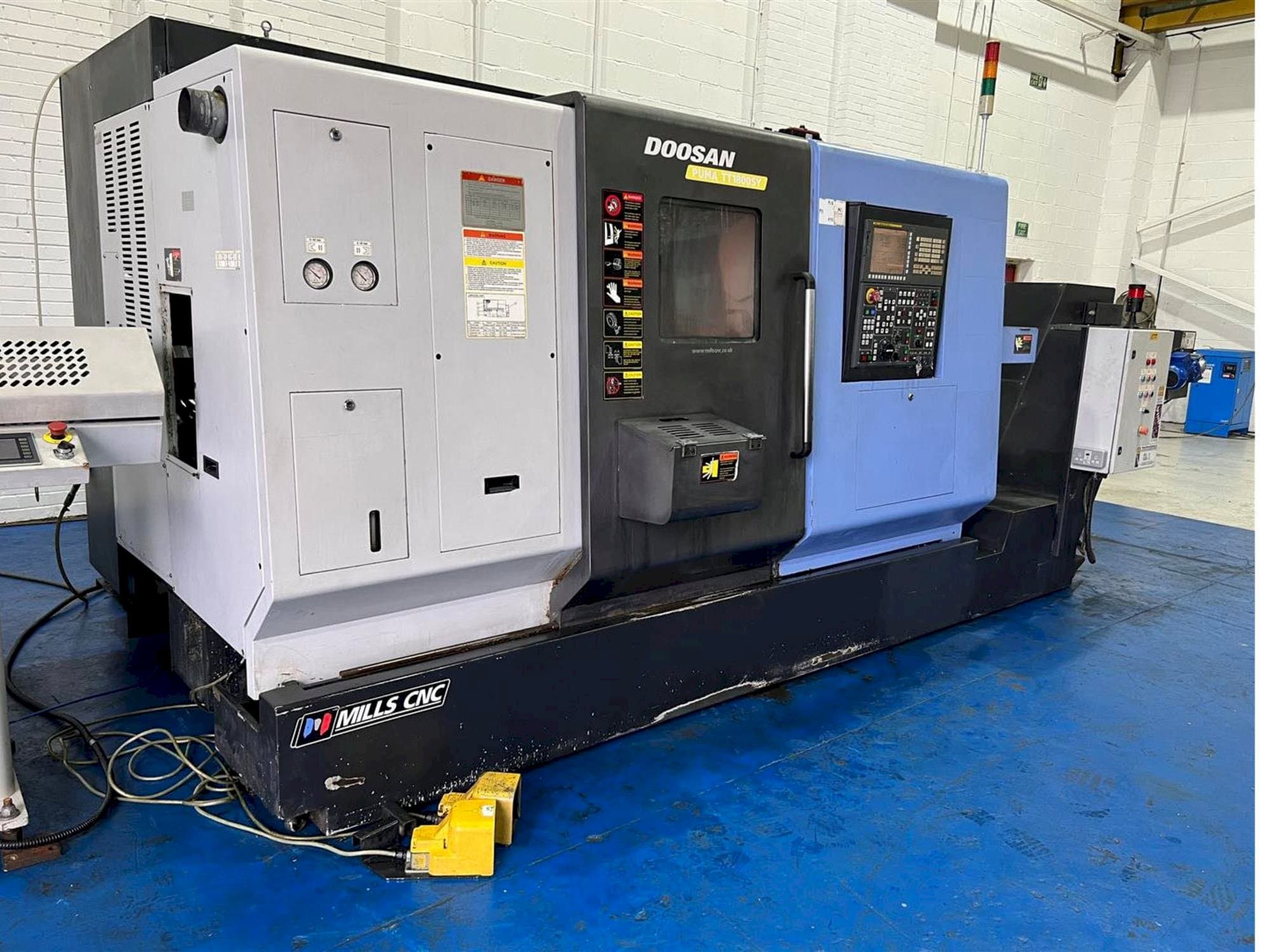 Front view of Doosan TT1800SY machine