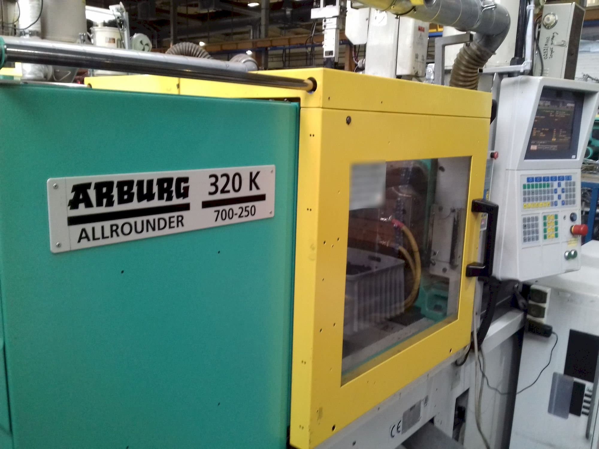 Front view of Arburg ALLROUNDER 320 K 700-250 machine