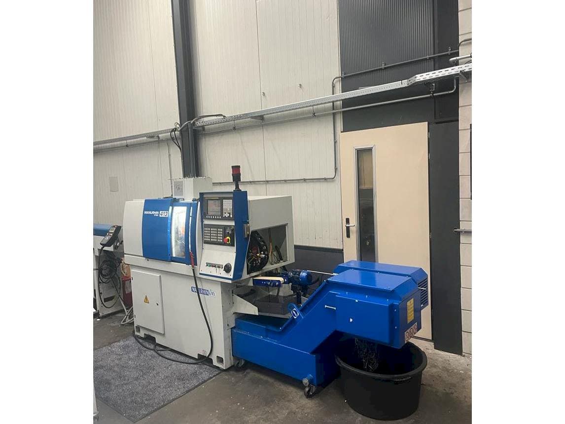 Front view of Manurhin K'MX 413  machine