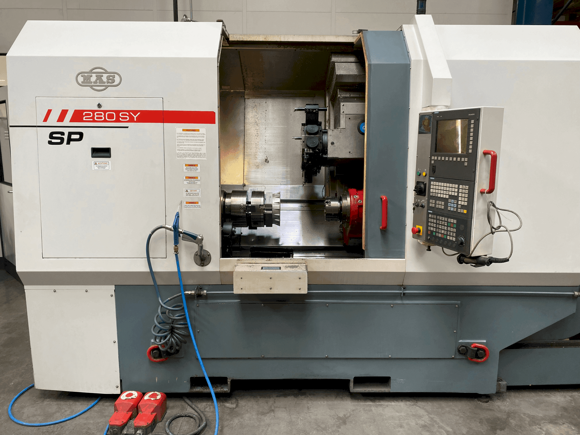 Front view of MAS SP280 SY machine