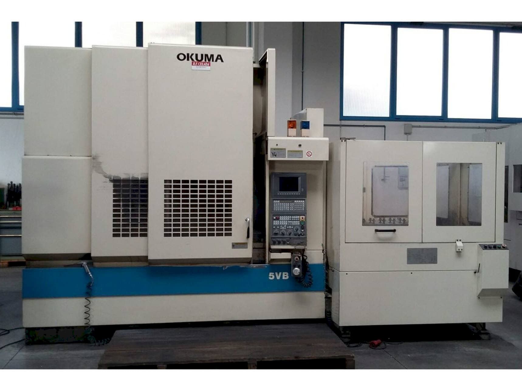 Front view of Okuma MX55 VB machine
