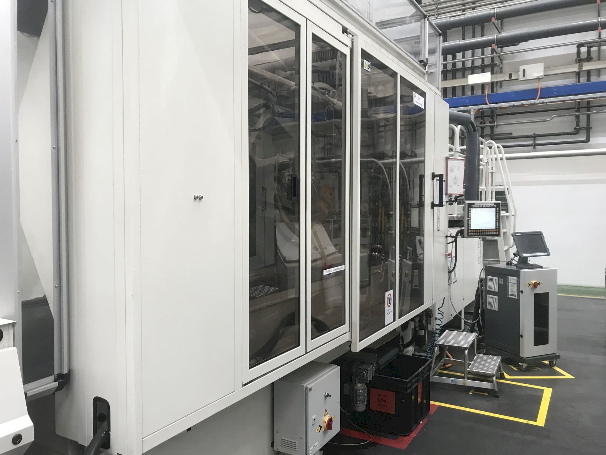 Left side view of Husky H500 RS 65/60 machine