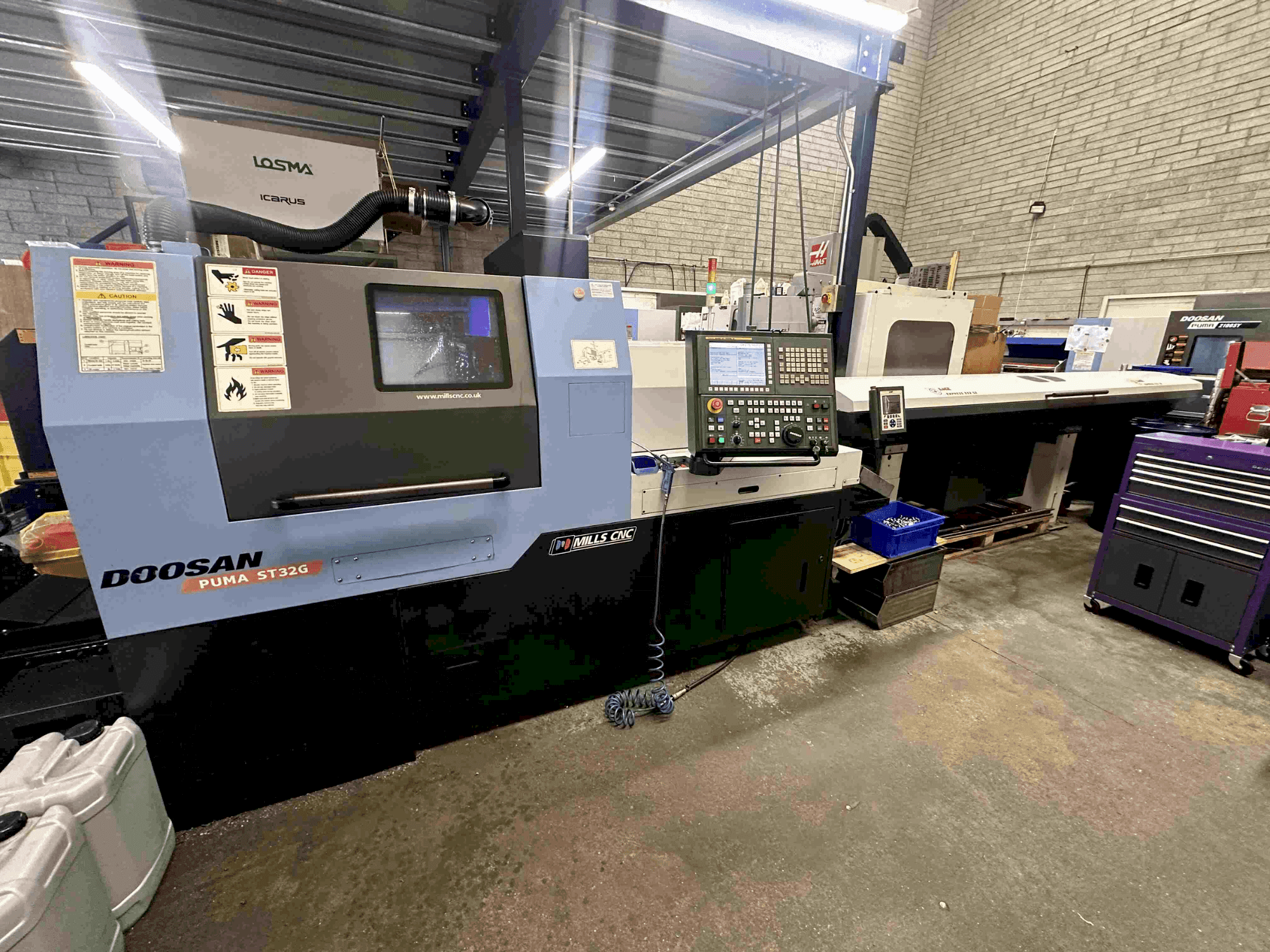 Front view of DOOSAN Puma ST32G machine