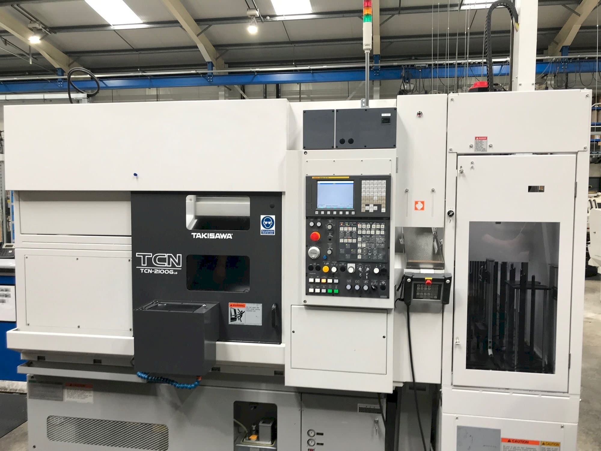 Front view of Takisawa TCN-2100G L6 machine