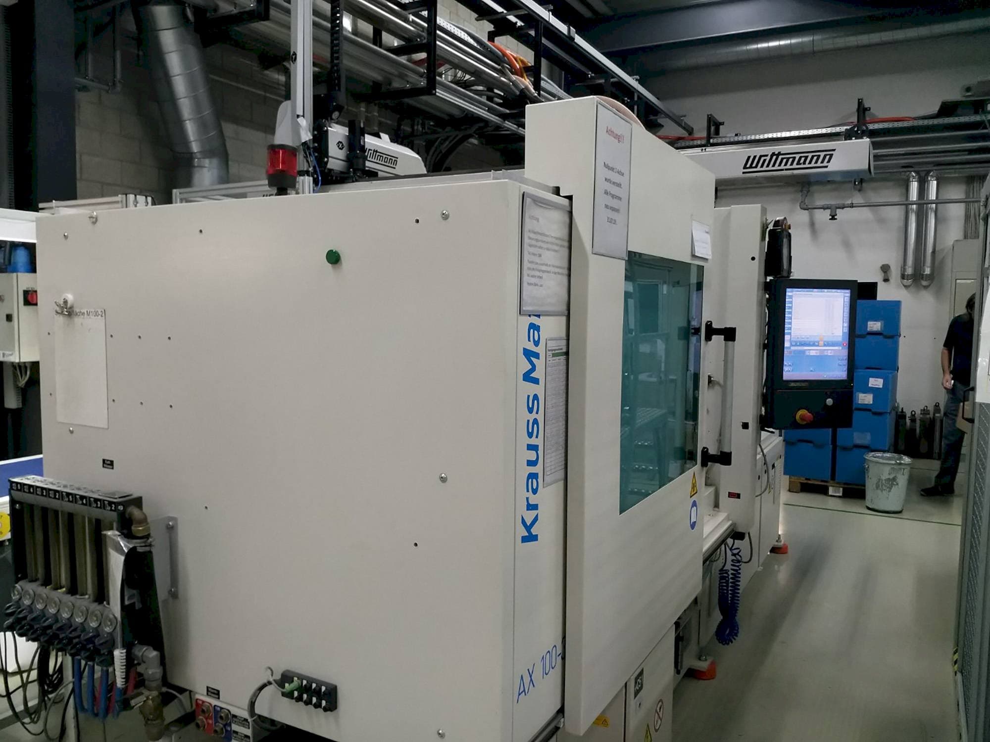 Front view of Krauss Maffei 100-380 AX machine