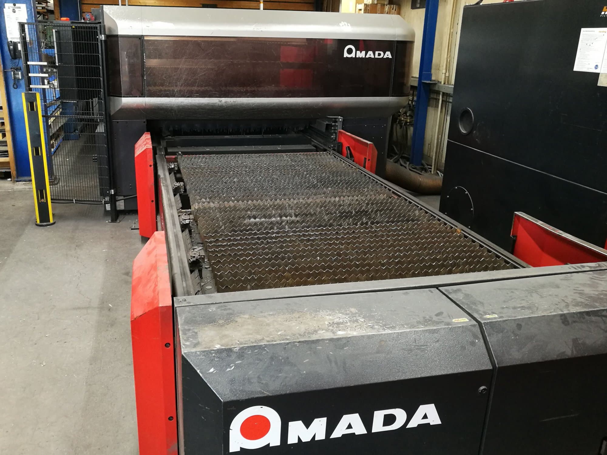 Front view of AMADA LC 3015 X1 NT Machine