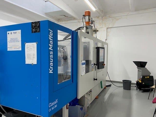 Left side view of Krauss Maffei ClassiX CX 160-380 machine