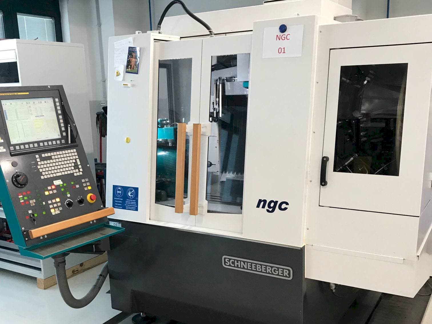 Front view of Schneeberger NGC machine