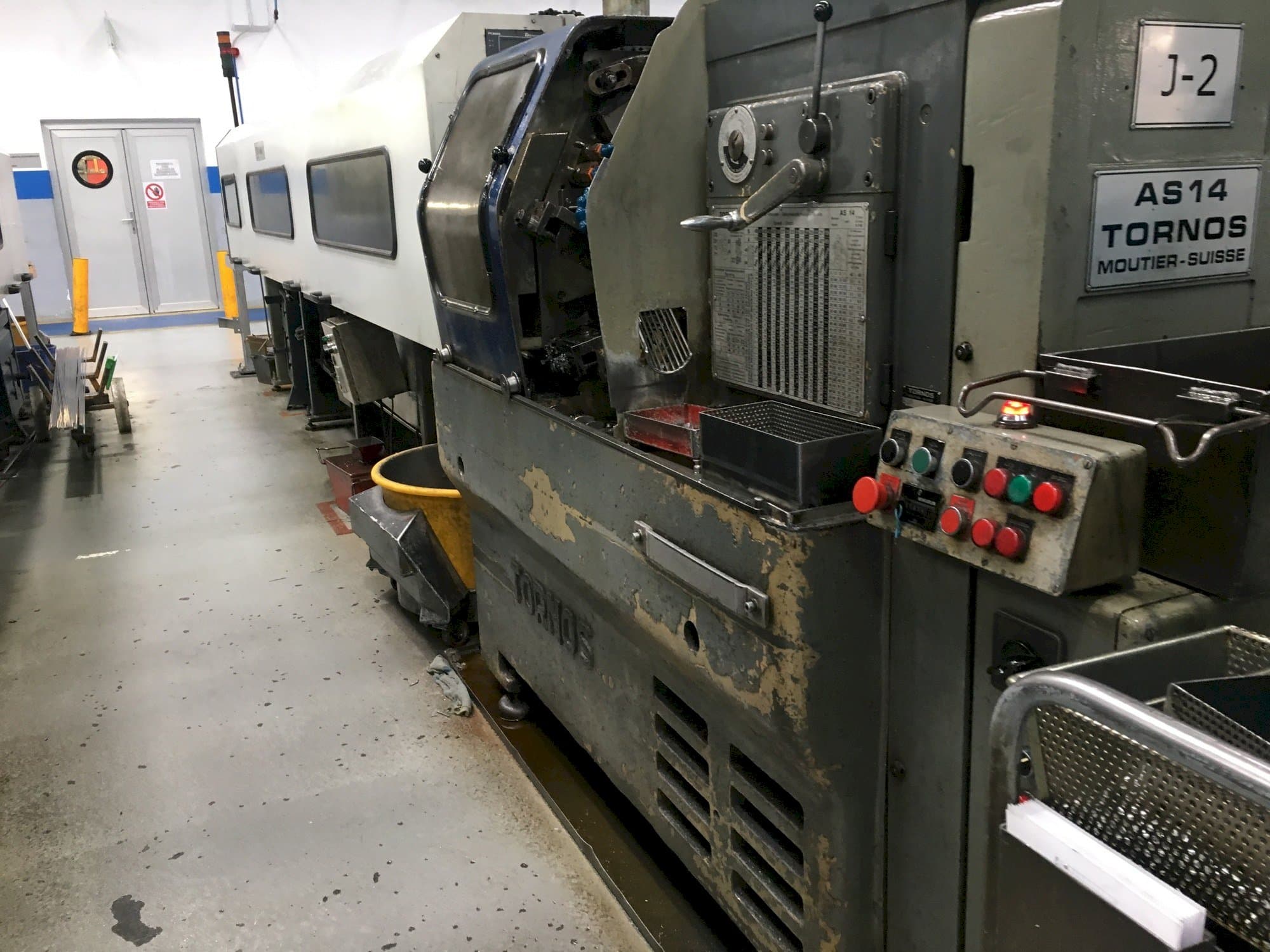 Front view of Tornos-Moutier Suisse AS 14 machine