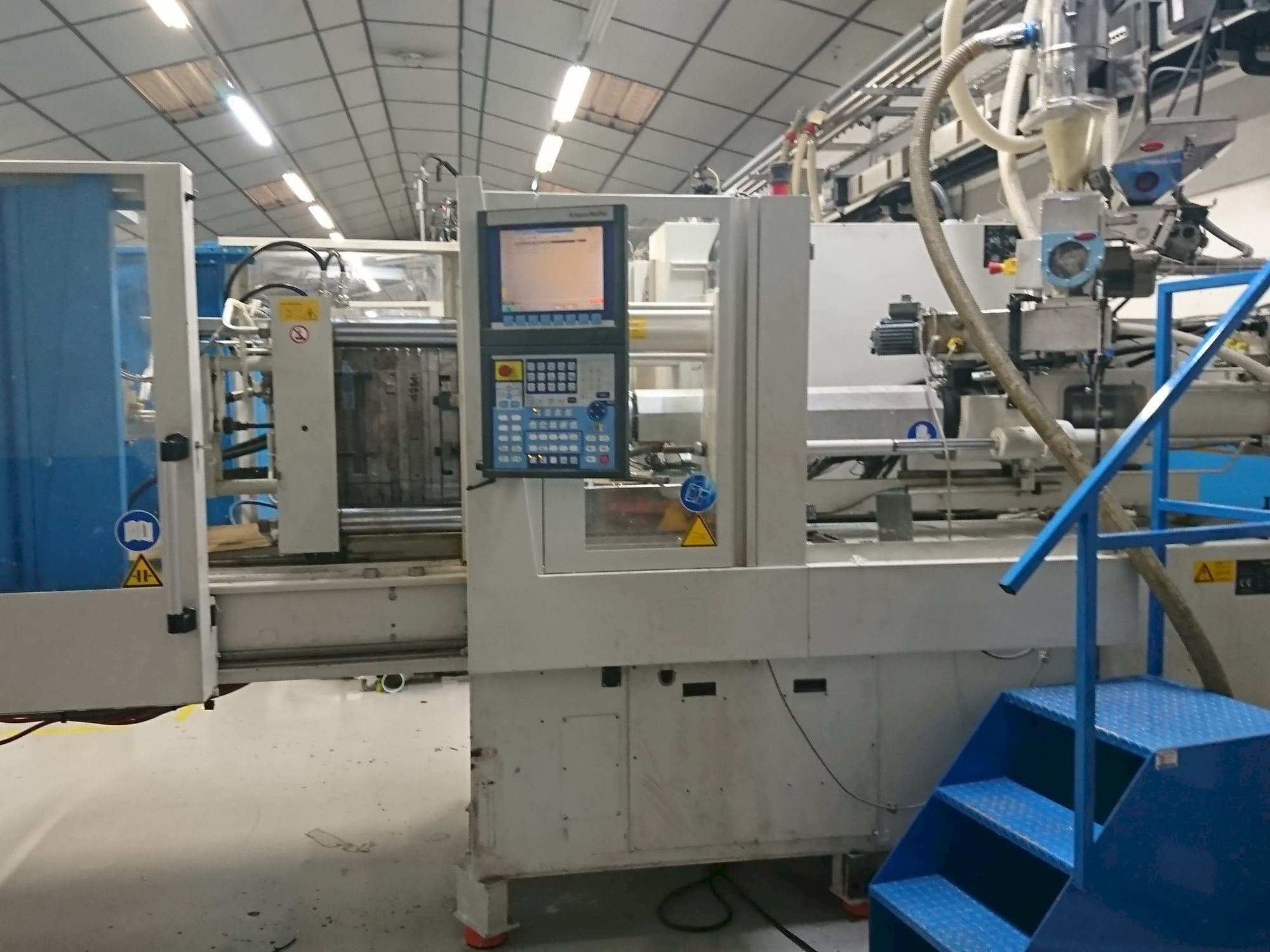 Front view of Krauss Maffei 80-750 CX machine