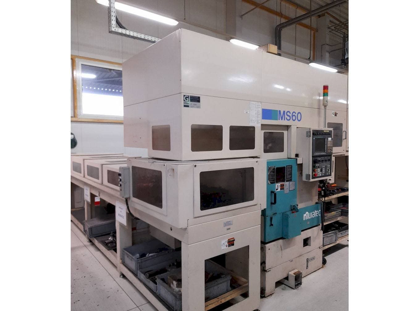 Front view of Muratec MS60 machine