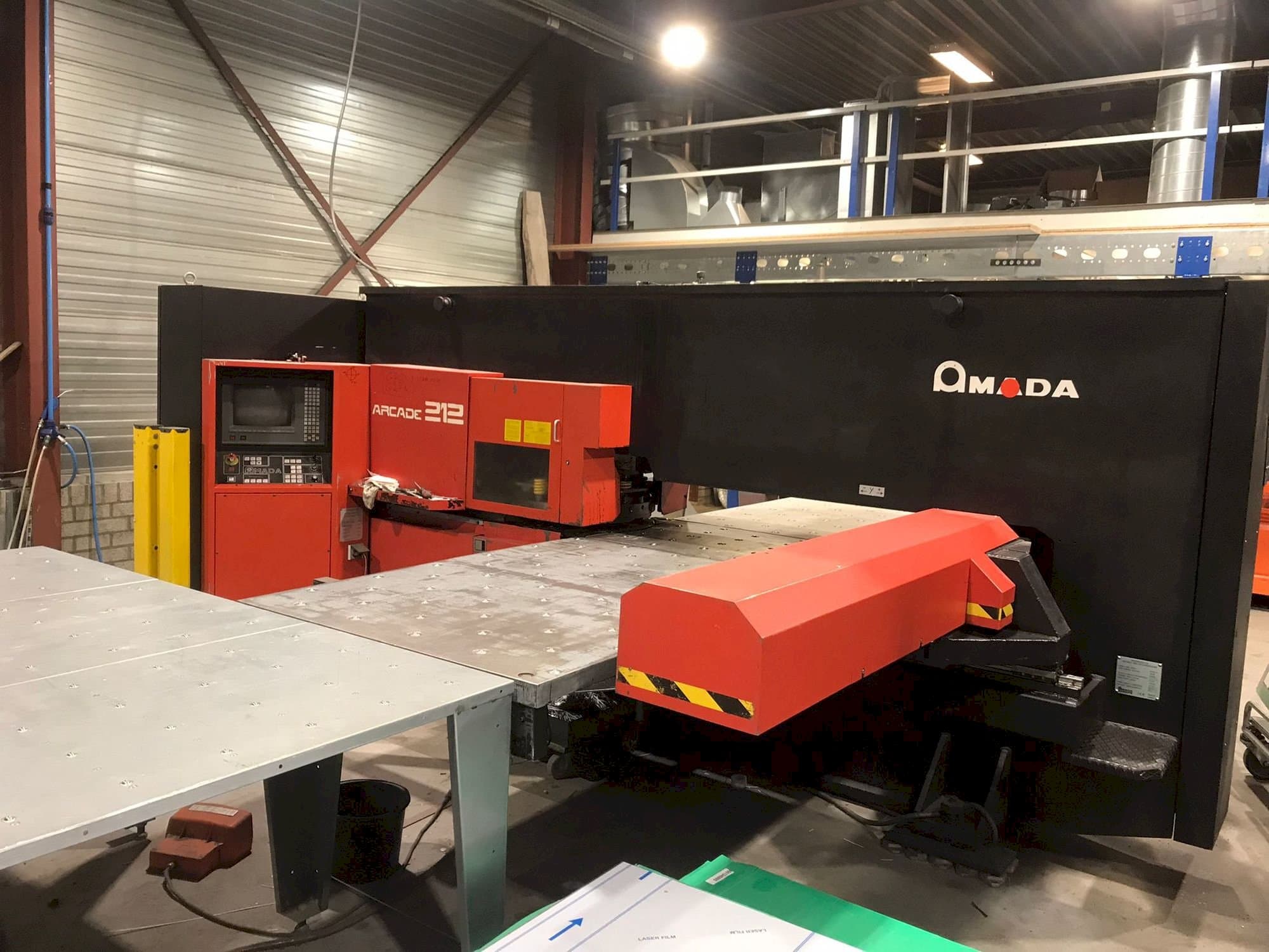 Front view of AMADA Arcade 212 machine