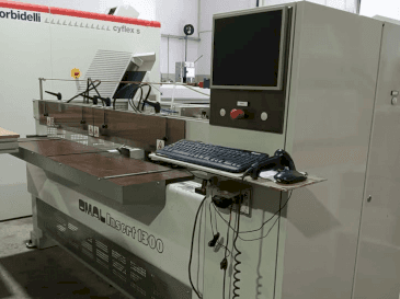 Front view of OMAL Insert 1300 machine