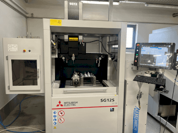 Front view of Mitsubishi SG12S machine