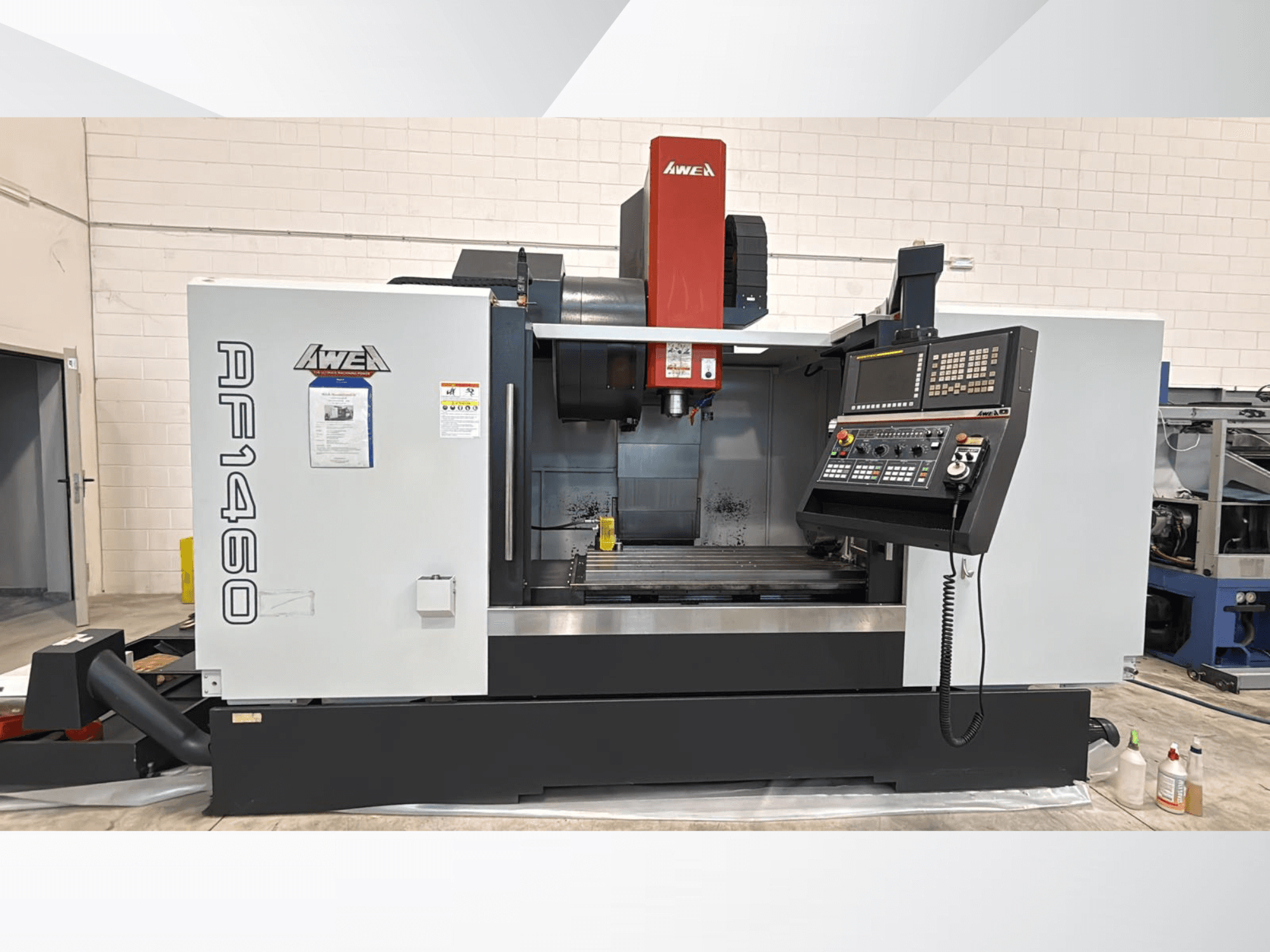 AWEA AF 1460 vertical machining center in front view, featuring a control panel and visible machining area.