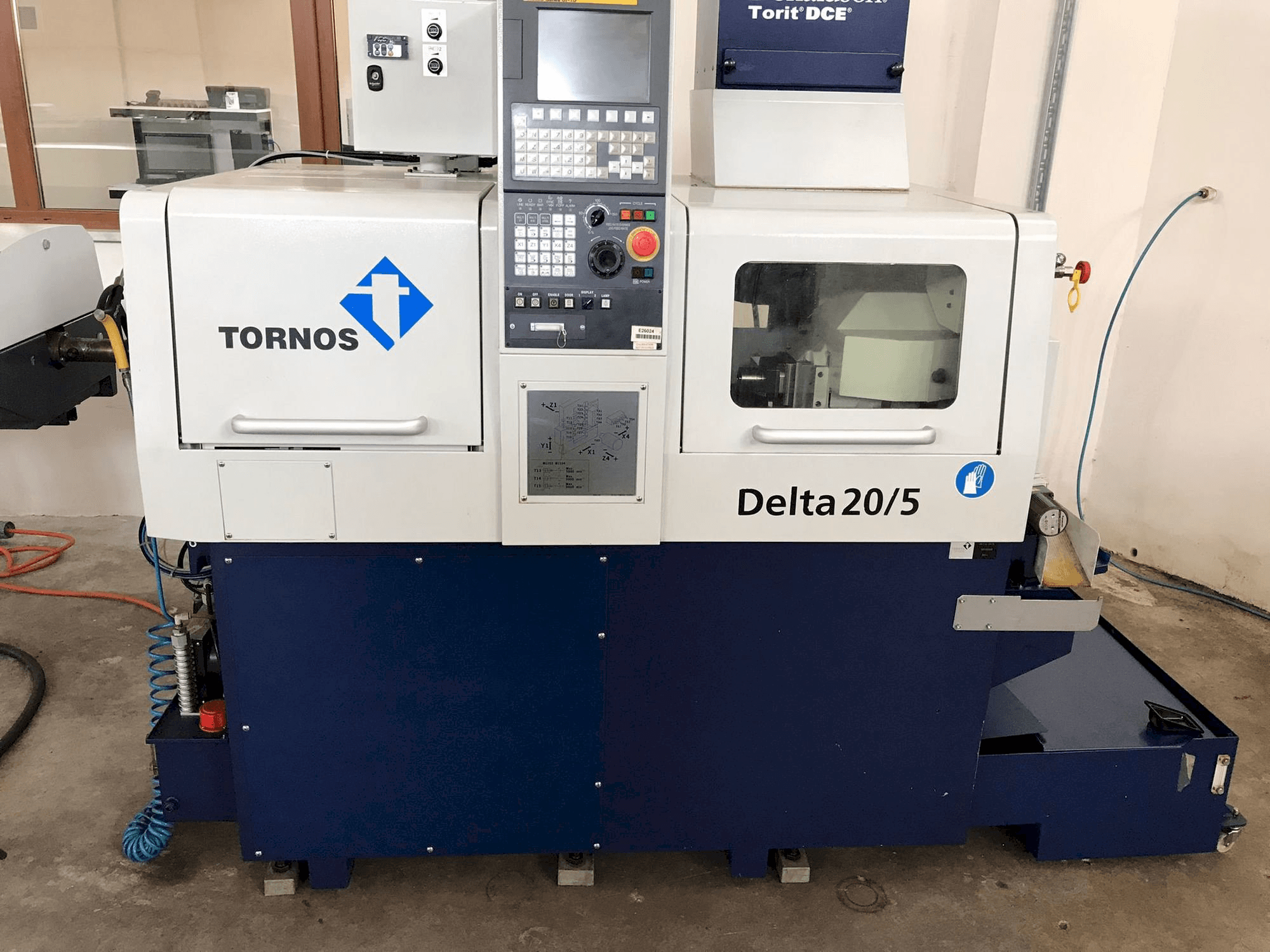 Front view of Tornos Delta 20/5 machine