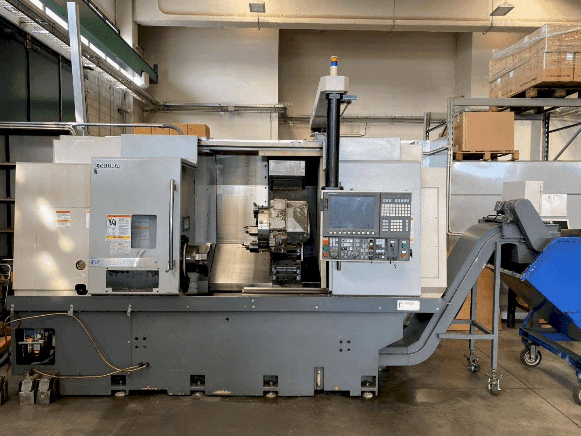 Front view of Okuma Genos L300E-MY machine