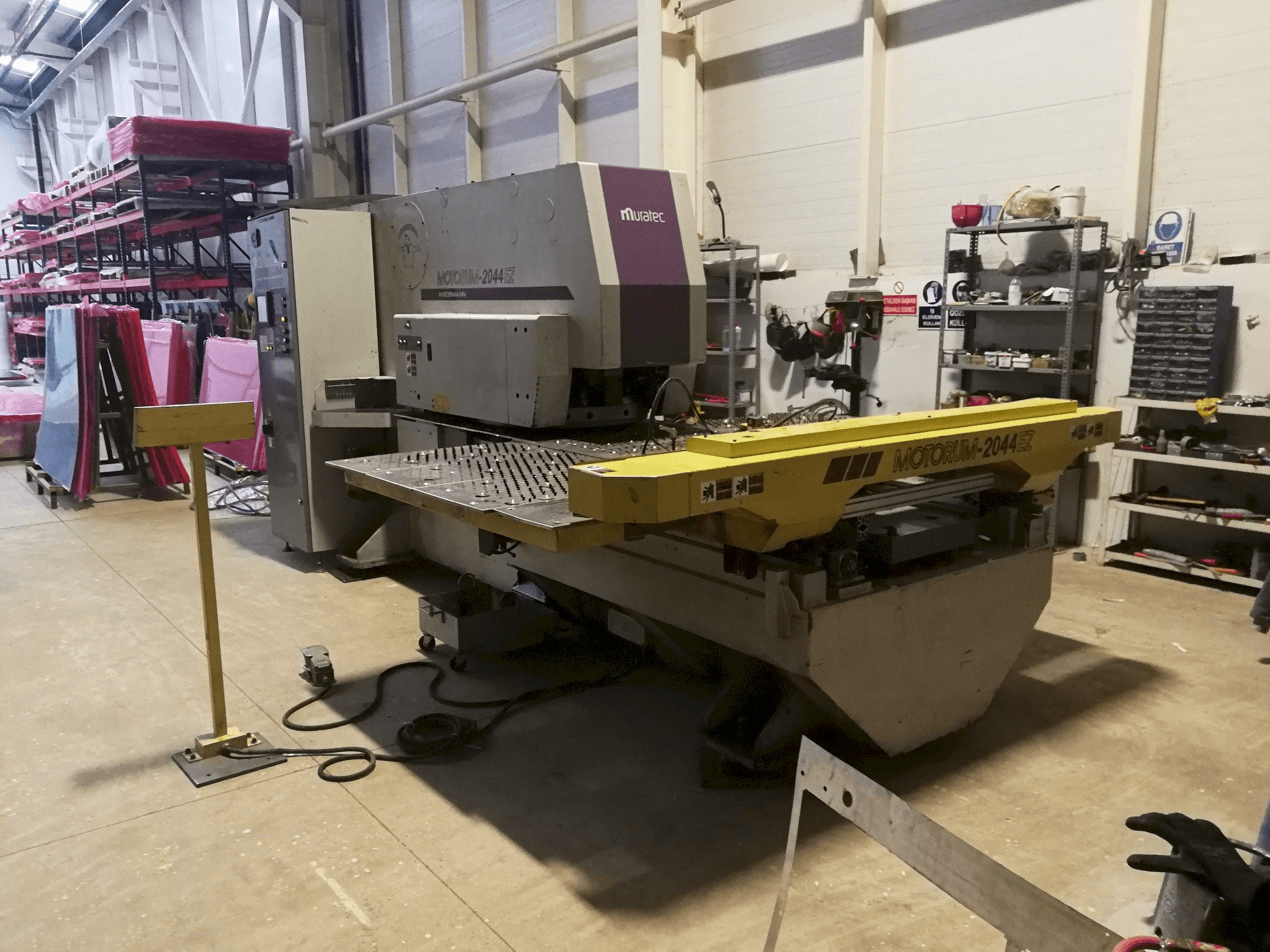 Left side view of Muratec Motorum 2044 EZ machine