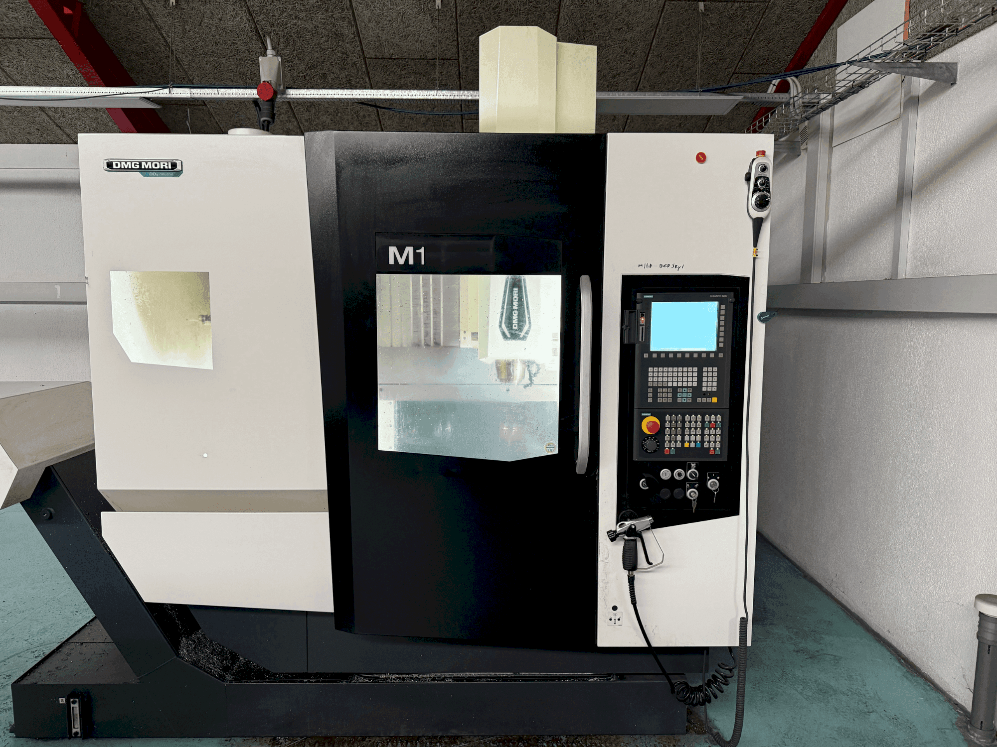Front view of DMG MORI M1 Pro machine