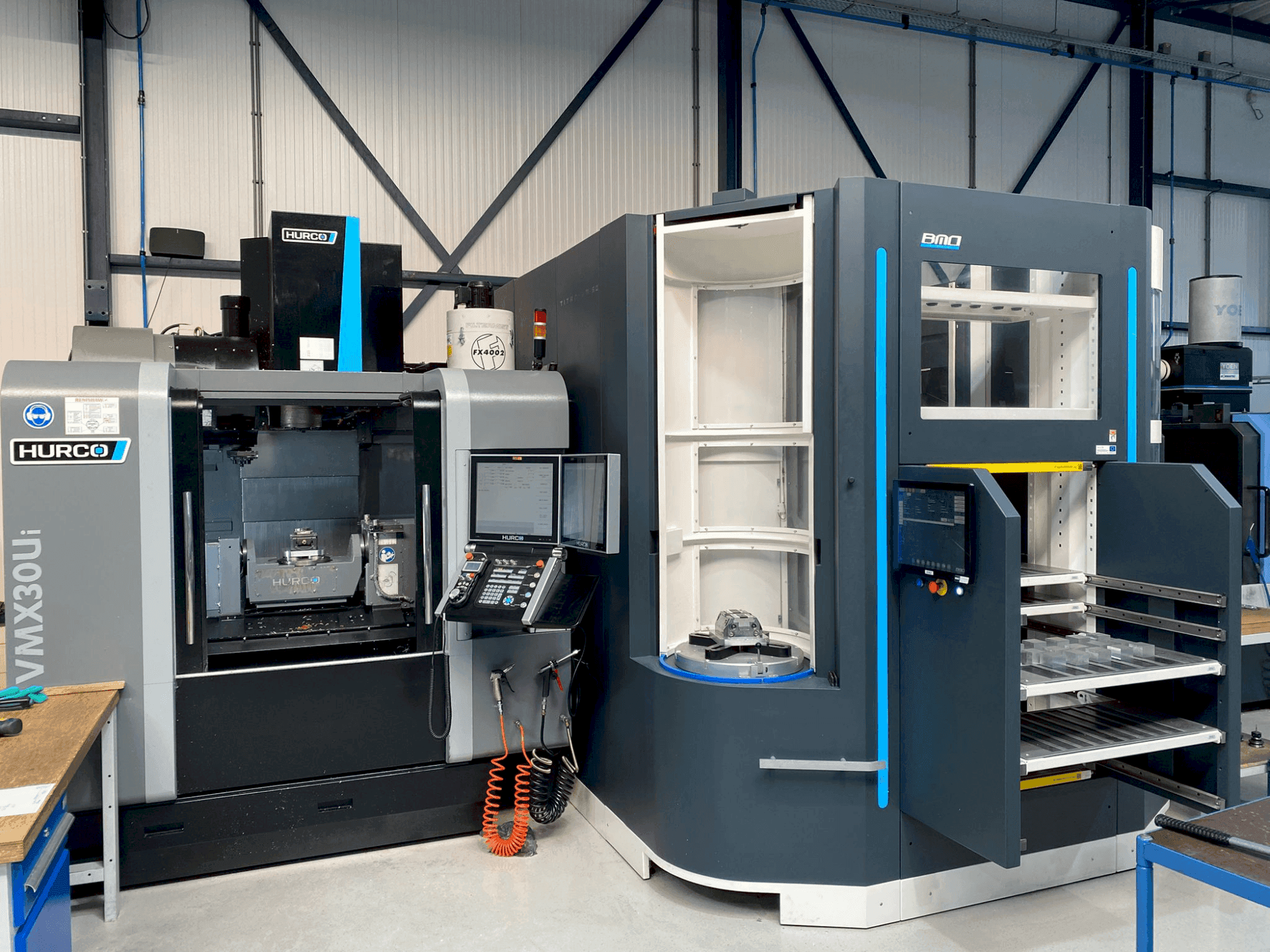 Front view of Hurco VMX30Ui + BMO Automation Titanium 50 machine