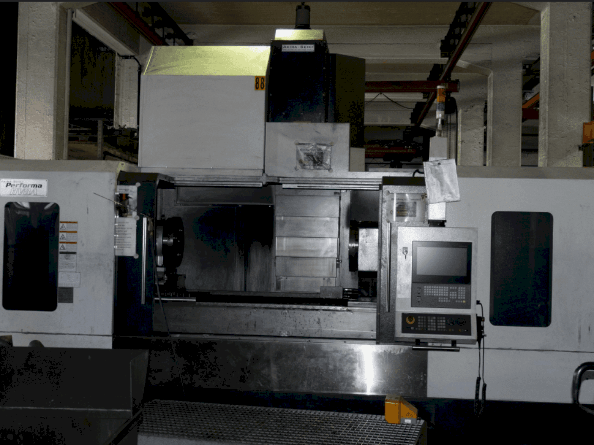 Front view of Akira Seiki Performa HV 8A machine