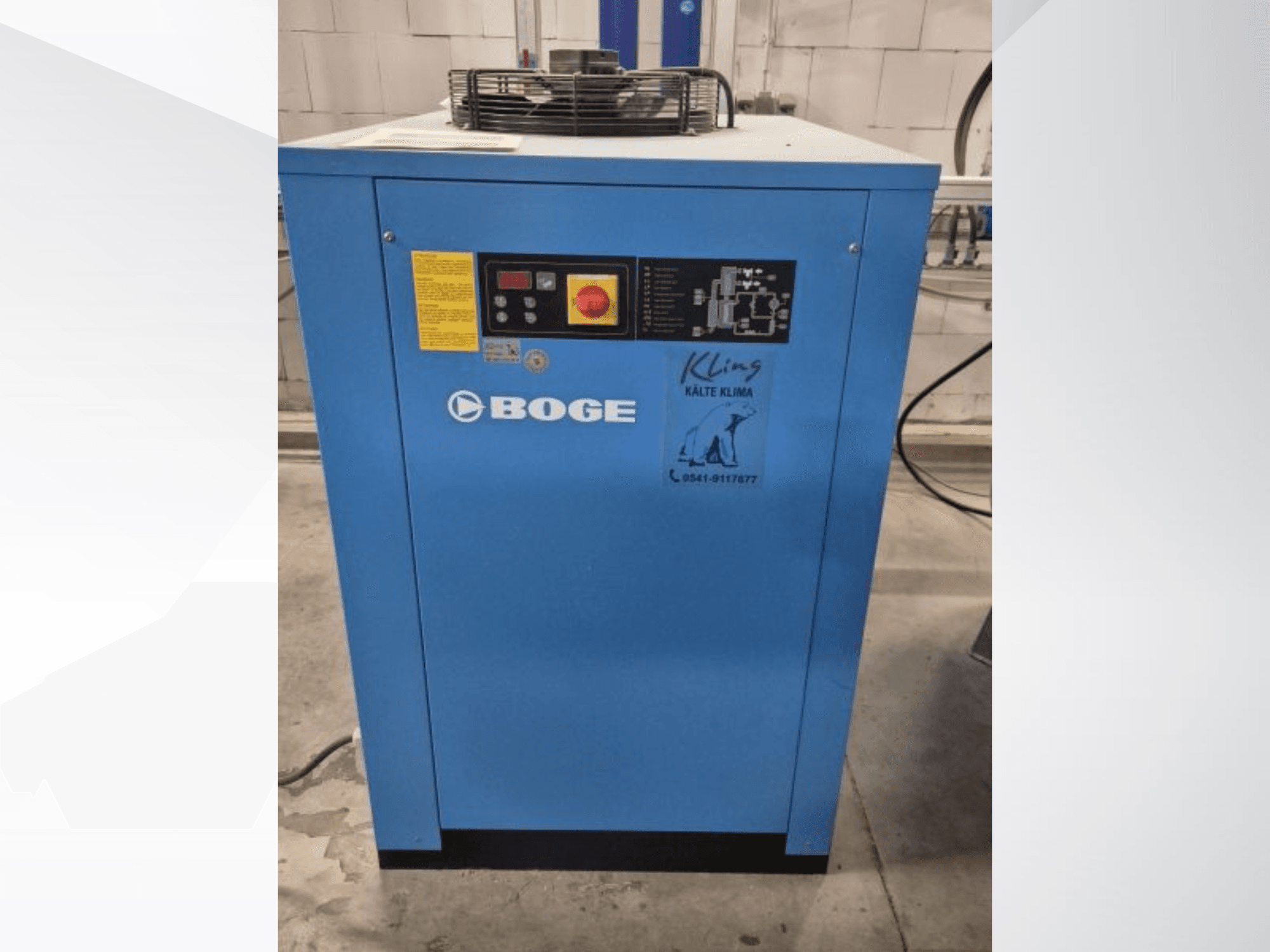 Front view of BOGE S 111-4, a blue industrial cooling unit with control panel and warning labels.