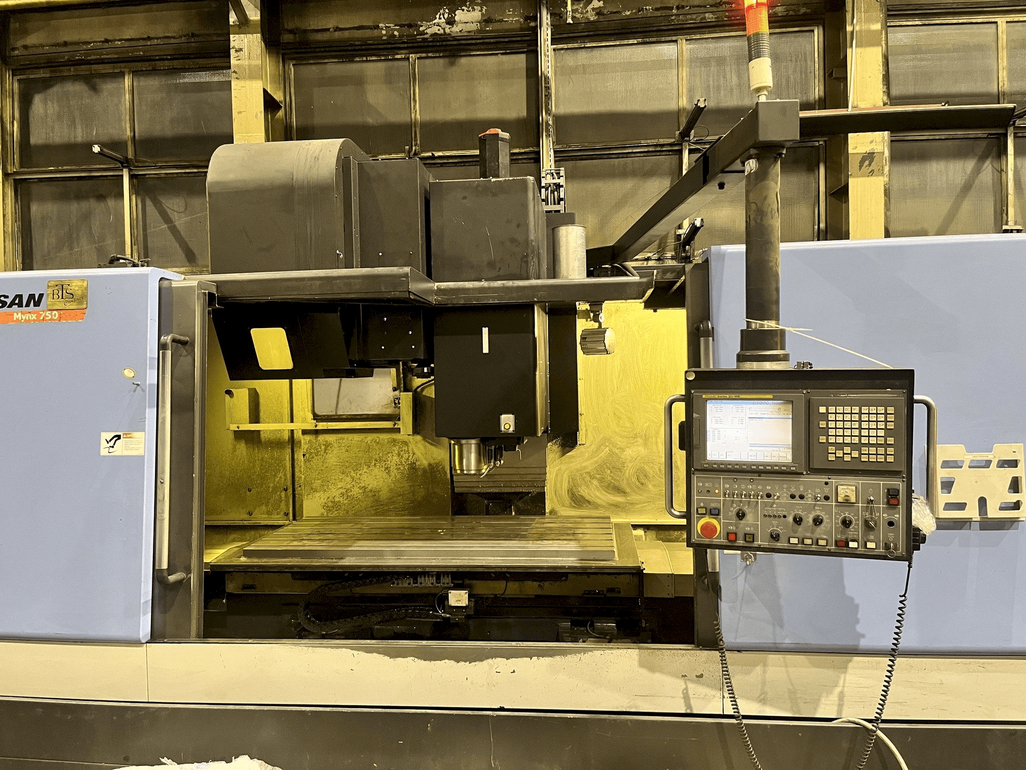 Front view of Doosan MYNX 750 machine