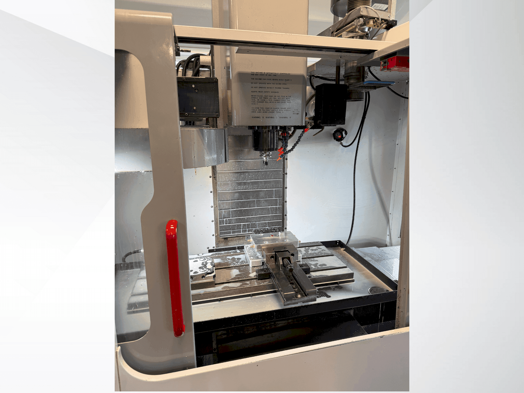 Front view of HAAS VF-2DHE machine