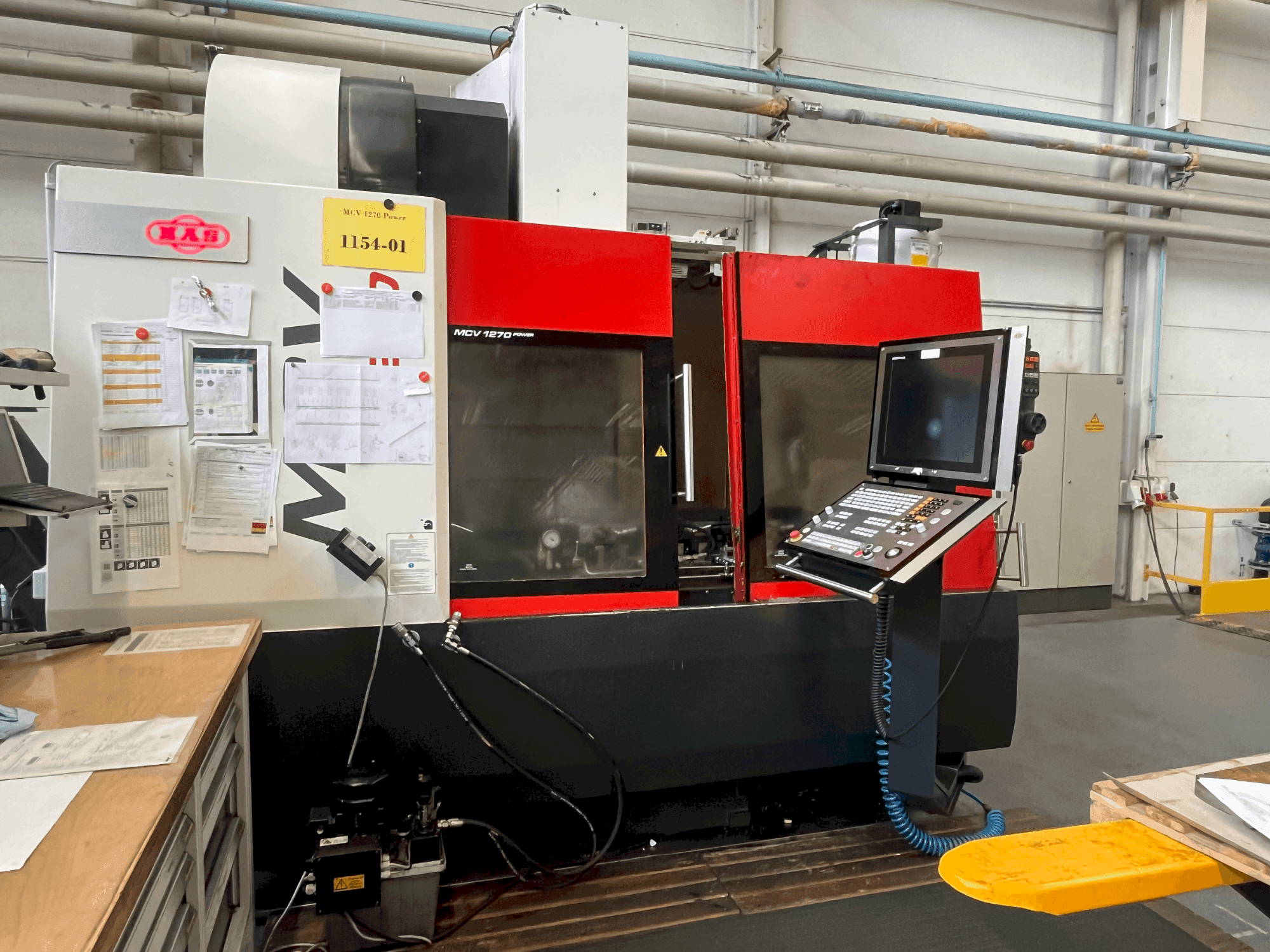 Front view of MAS MCV 1270 Power machine