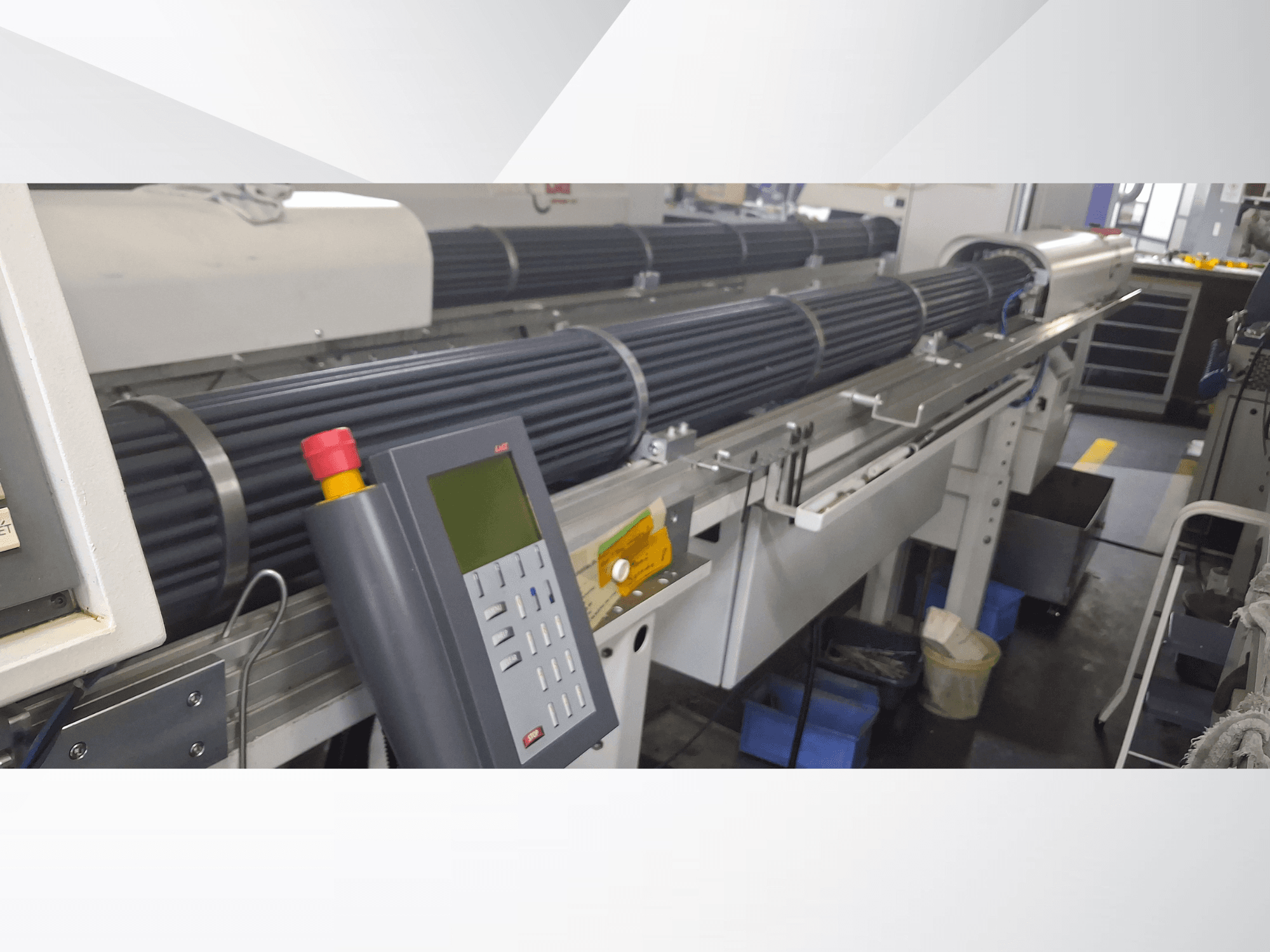 Swiss Type Turning Machine TORNOS DECO 10a in front view, featuring a control panel and rotating barrels for precision machining.