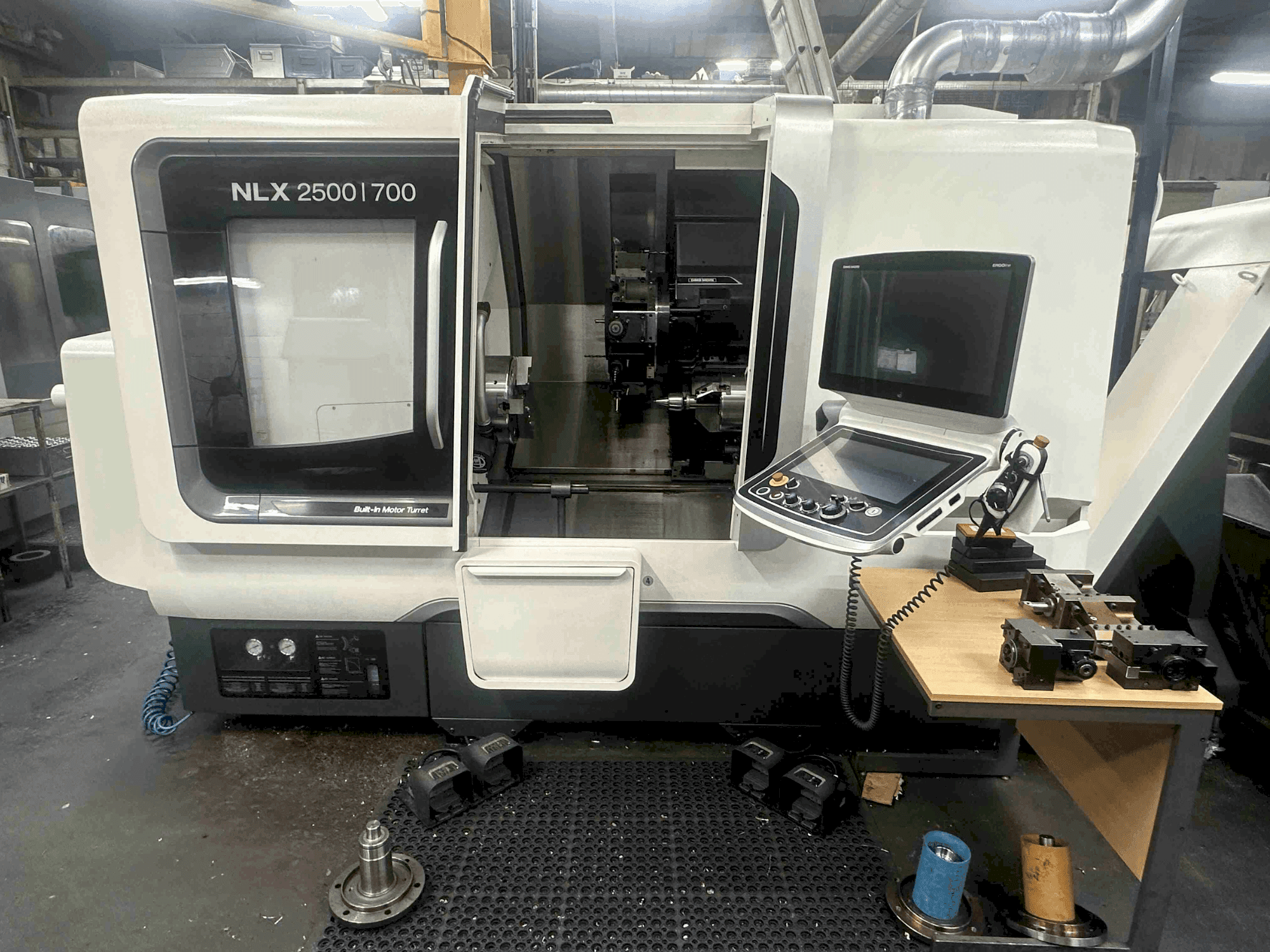 Front view of DMG MORI NLX2500SY/700 machine