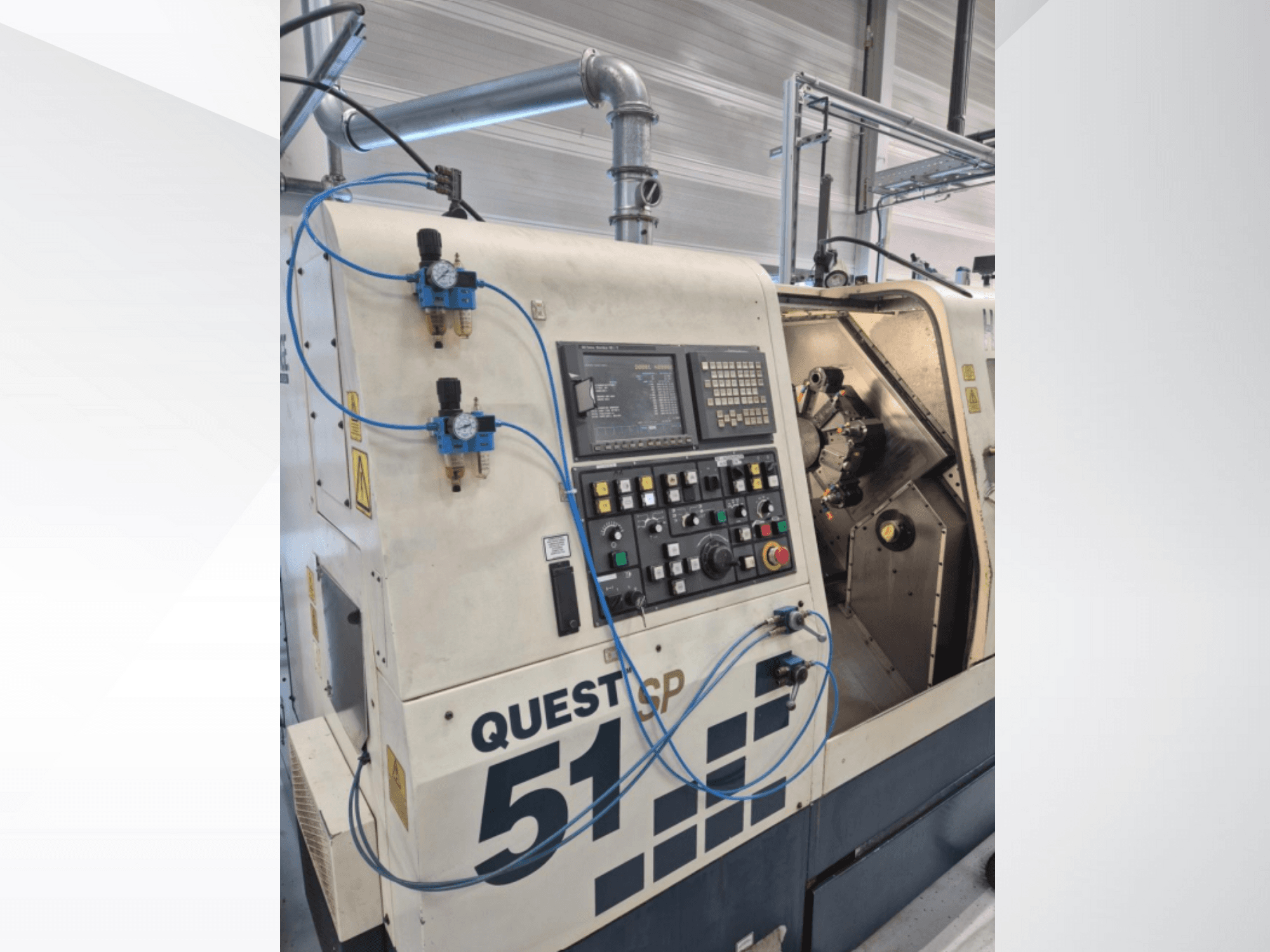 Questcp 51 CNC machine front view, control panel with buttons and display, pneumatic controls, industrial design.