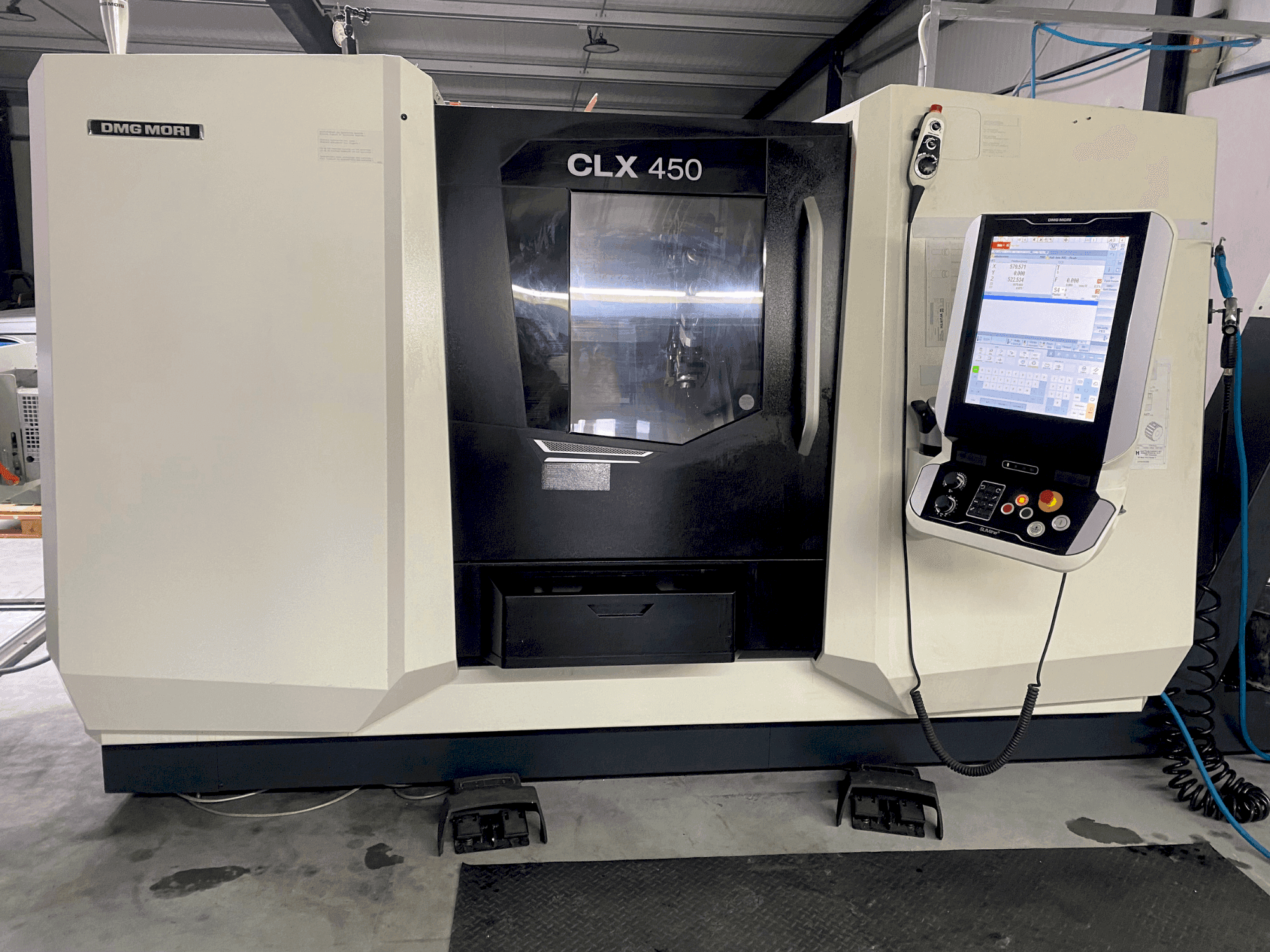 Front view of DMG MORI CLX 450 V6 machine