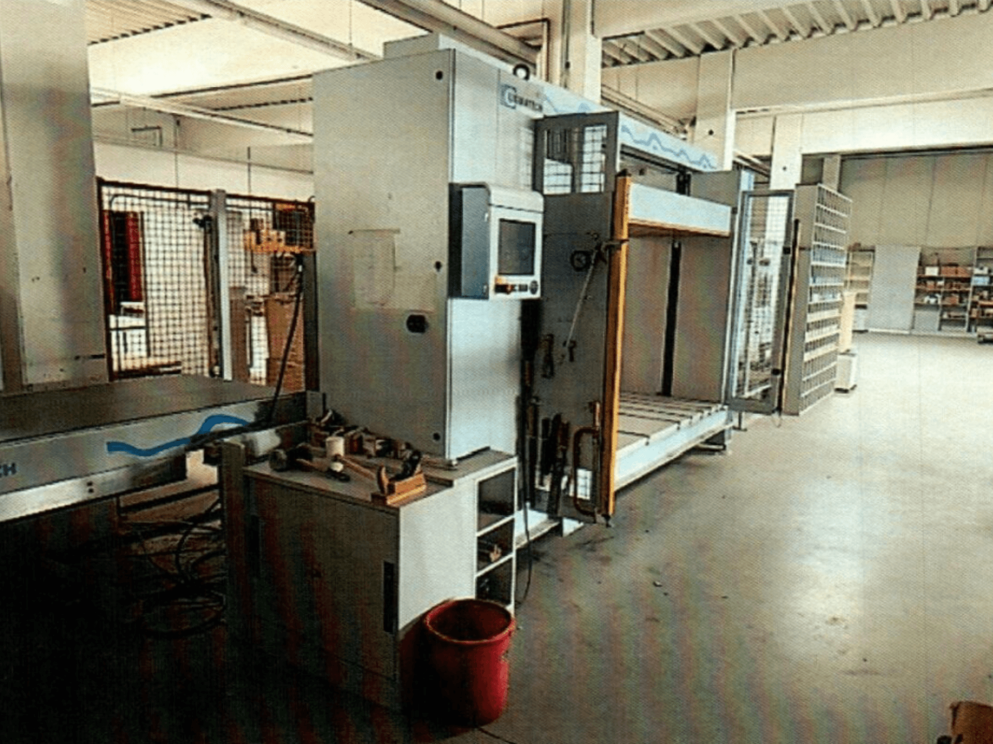 LIGMATECH MPH 510/25/09 laminating press in a factory setting, front view with open access and control panel visible.