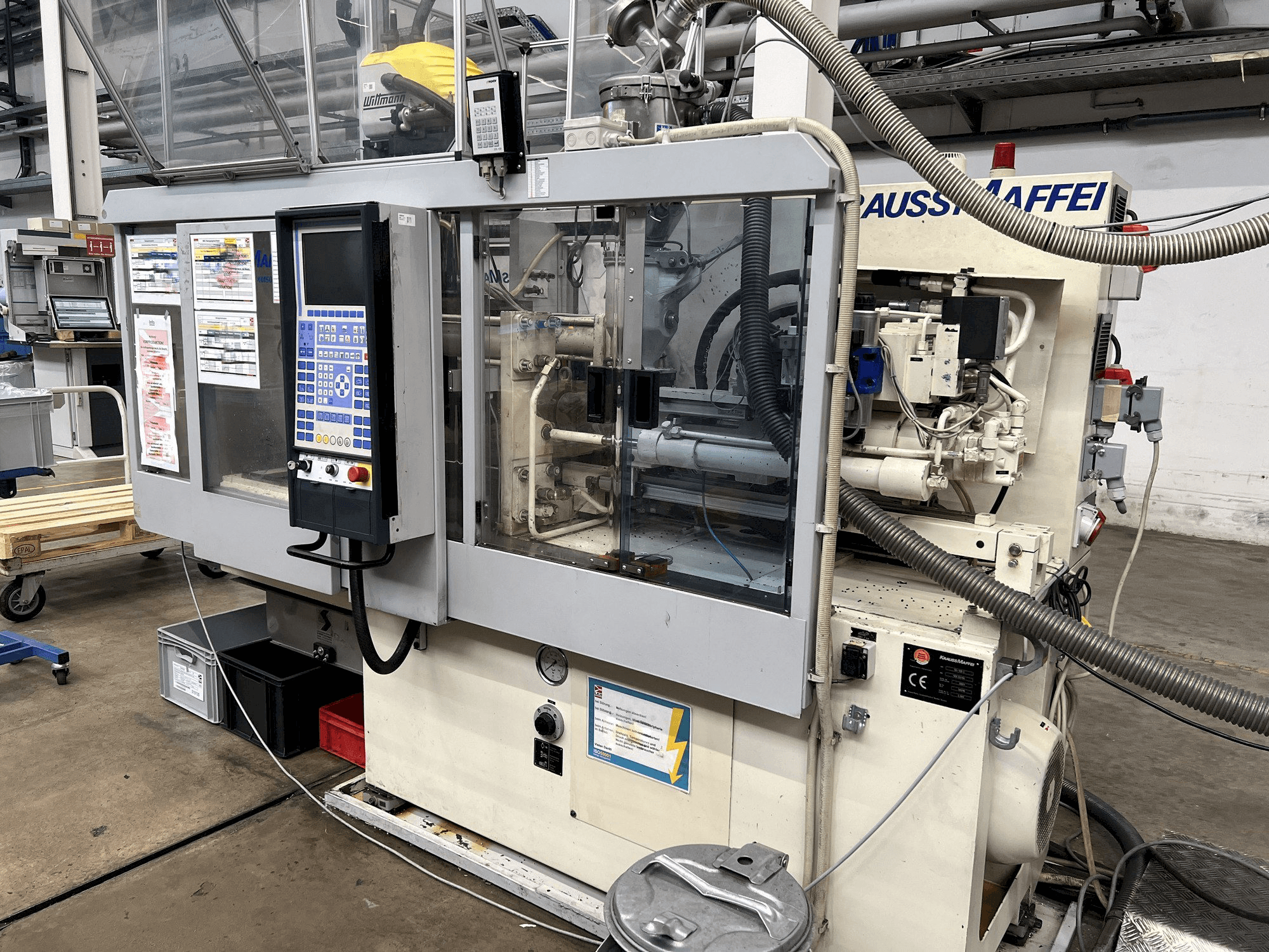 Front view of Krauss Maffei KM 50-125 C1 machine