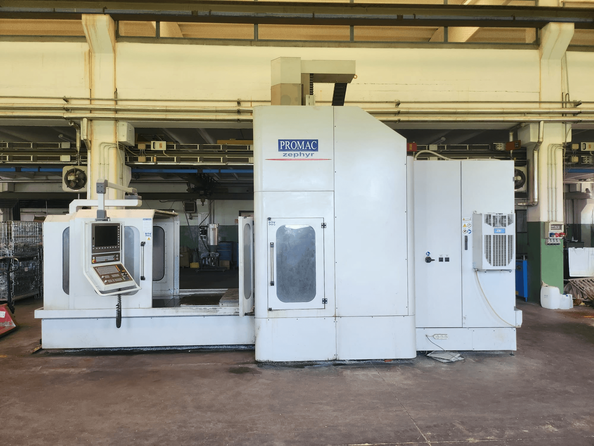 Front view of the PROMAC ZEPHYR VT 2.5 XL Vertical Machining Centre showing control panel and machining area.
